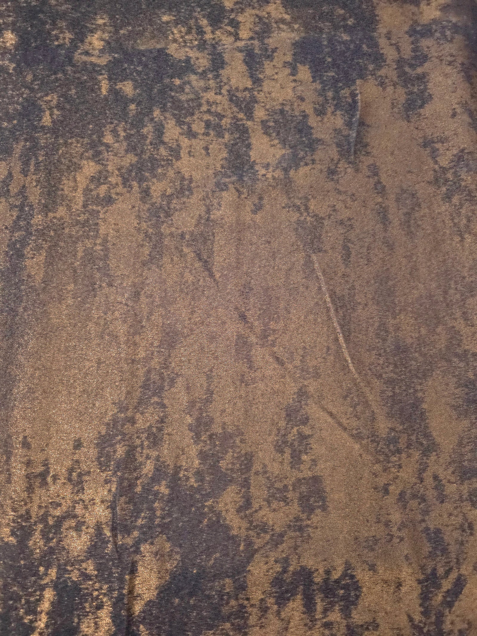 Flat view of Cocoa Bronze Lurex Italiano fabric showing its metallic foil surface for luxury apparel.