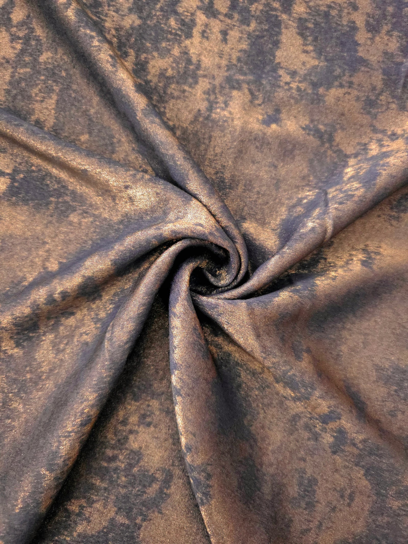 Rosette drape of Cocoa Bronze Lurex Italiano fabric emphasizing shimmer for kaftans and occasionwear.