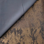 Reverse side of Cocoa Bronze Lurex Italiano fabric showing the backing and metallic finish for garment production.