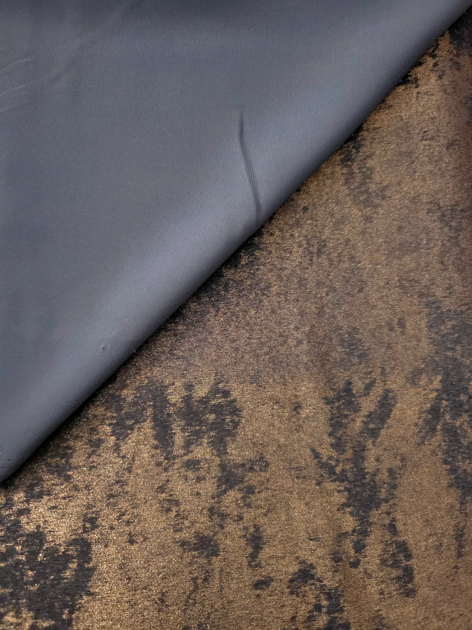 Reverse side of Cocoa Bronze Lurex Italiano fabric showing the backing and metallic finish for garment production.