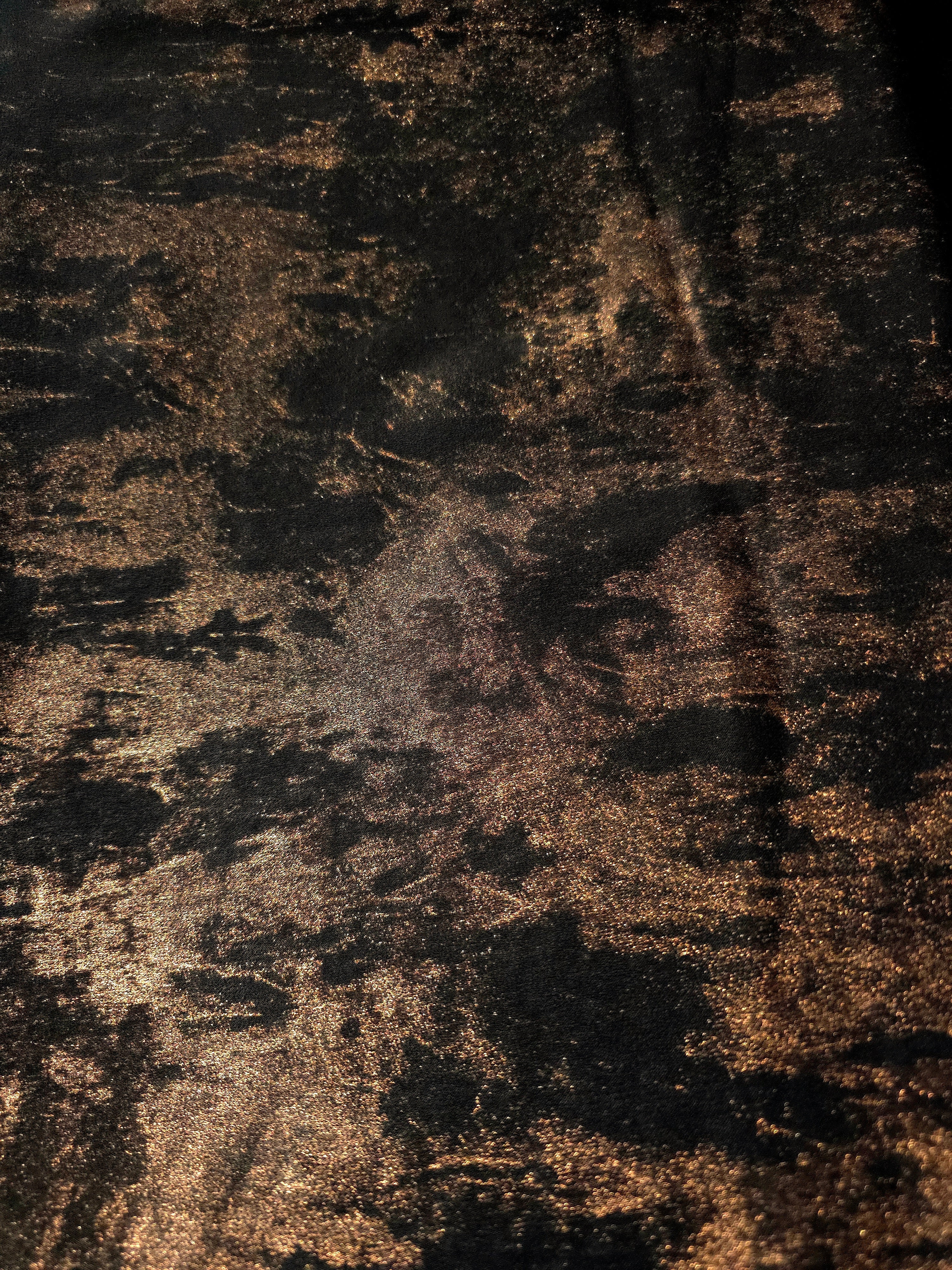 Flat texture view of Copper Black Lurex Italiano metallic fabric for luxury dressmaking