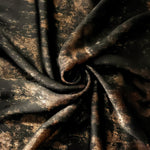 Rosette drape of Copper Black Lurex Italiano fabric emphasizing shimmer for kaftans and occasionwear.