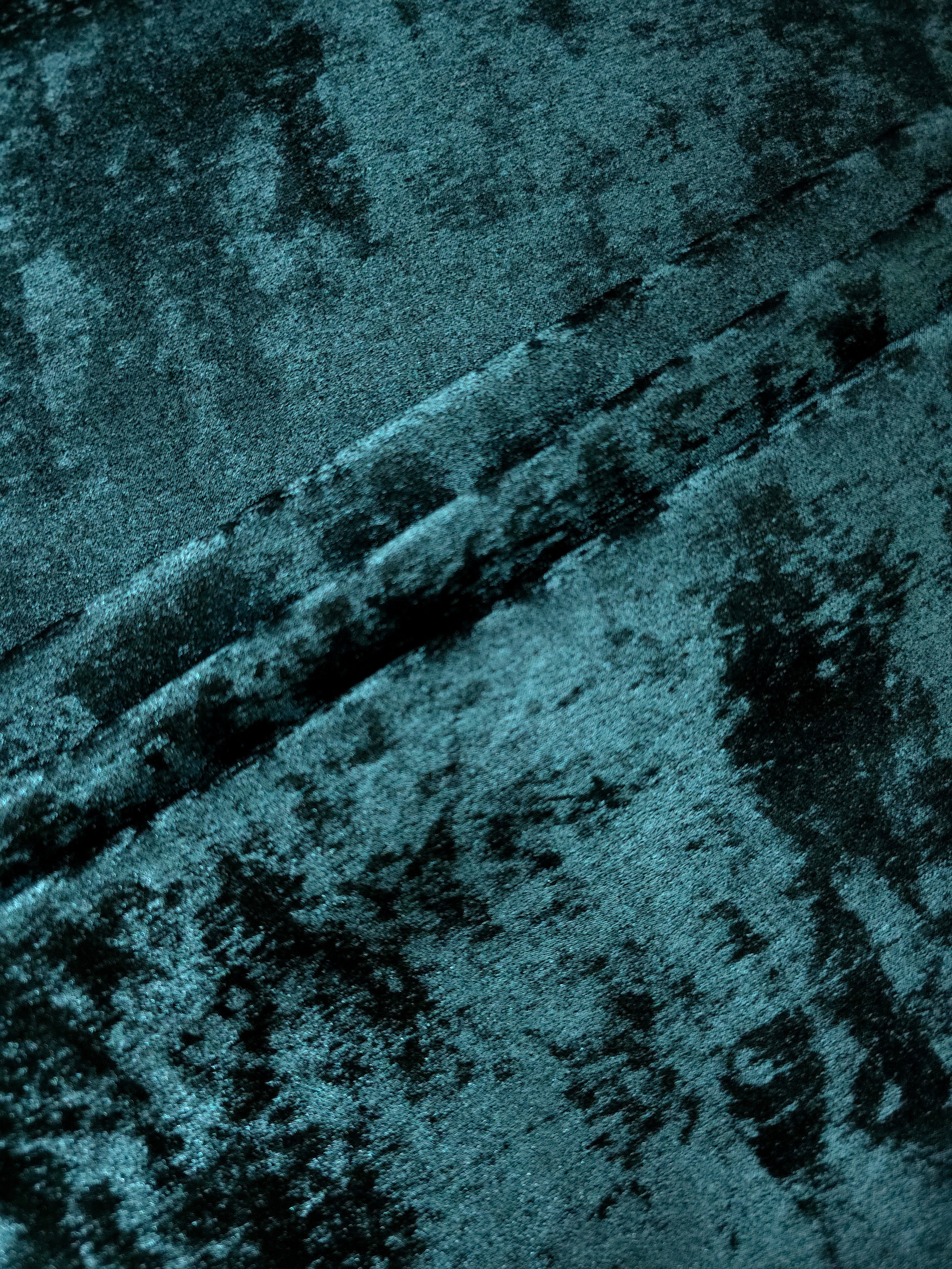 Deep Teal Lurex Italiano metallic fabric arranged in diagonal eveningwear folds