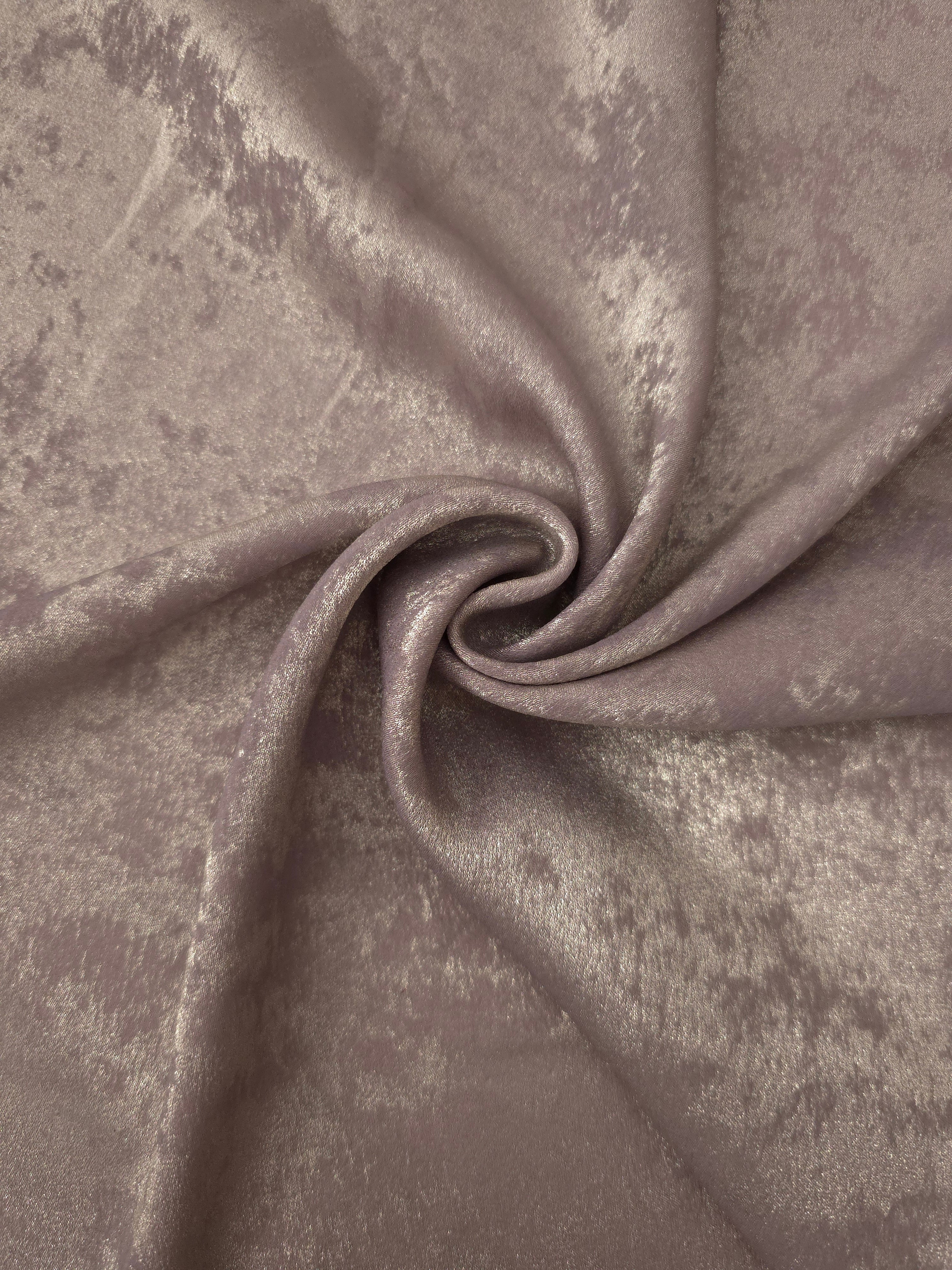 Flowing folds of Dusty Mauve Lurex Italiano fabric highlighting drape for abayas, kaftans and dresses.