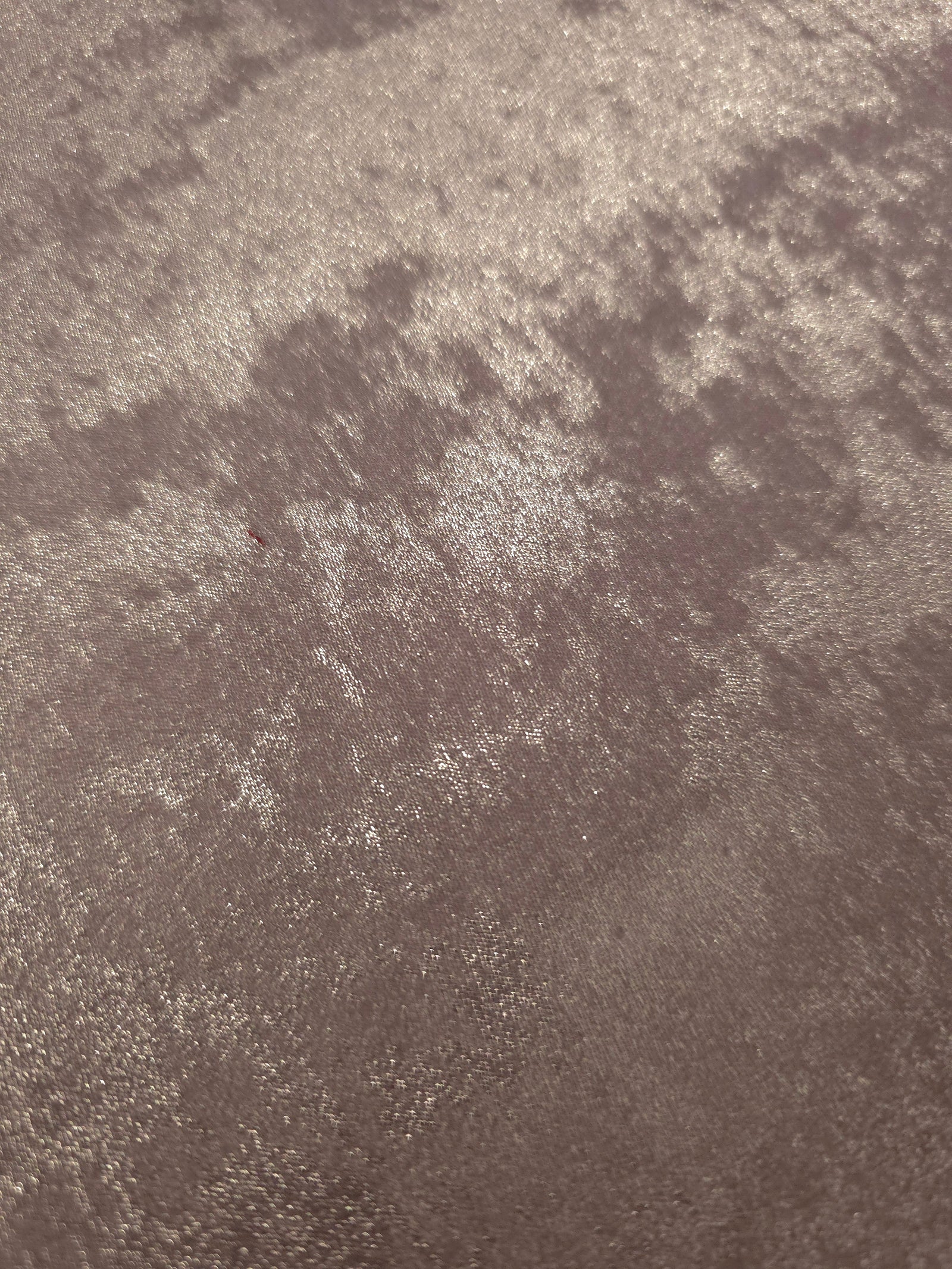 Macro close-up of Dusty Mauve Lurex Italiano fabric revealing metallic texture for designer apparel.