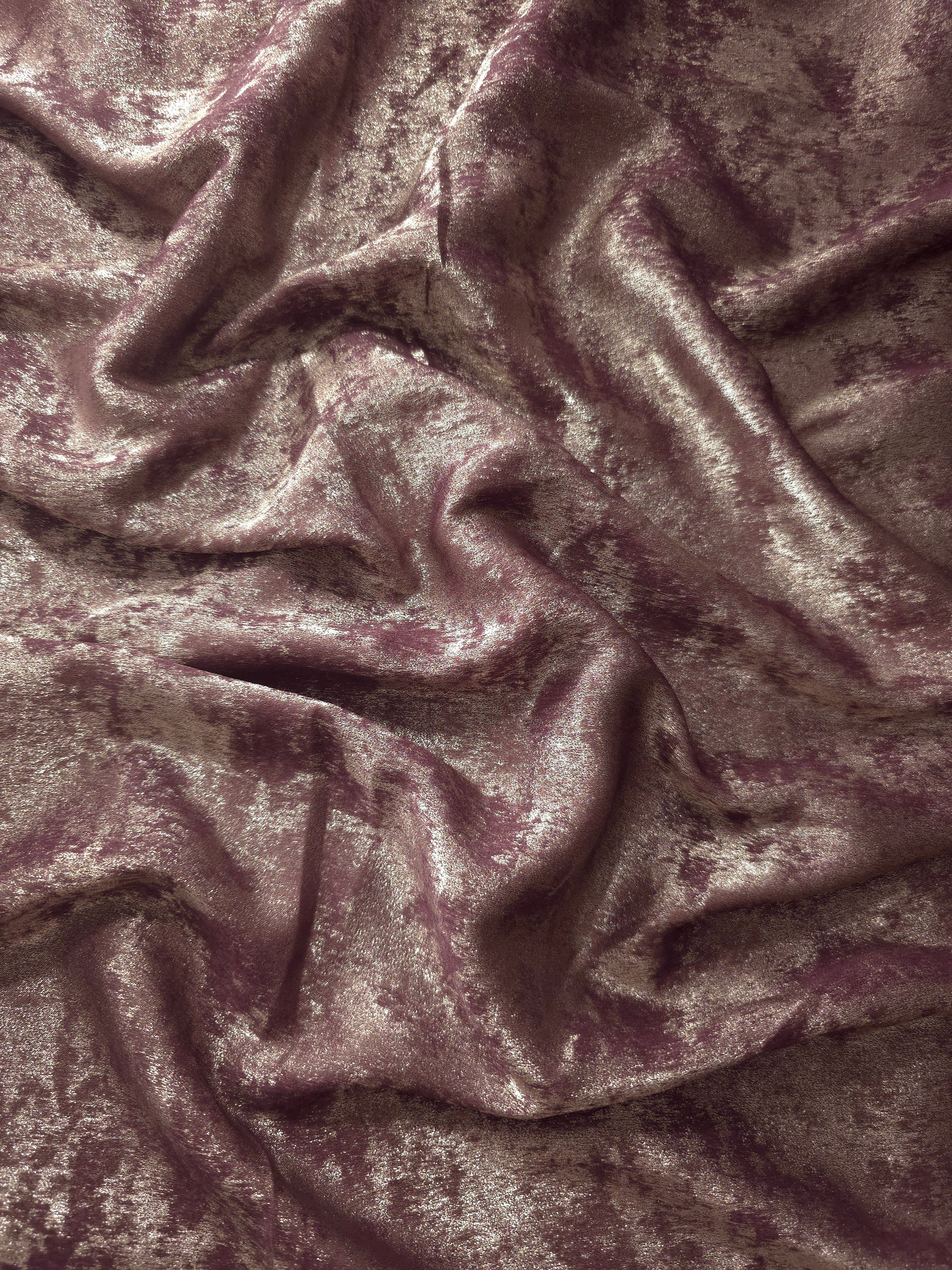 Flowing folds of Dusty Plum Lurex Italiano fabric highlighting drape for abayas, kaftans and dresses.
