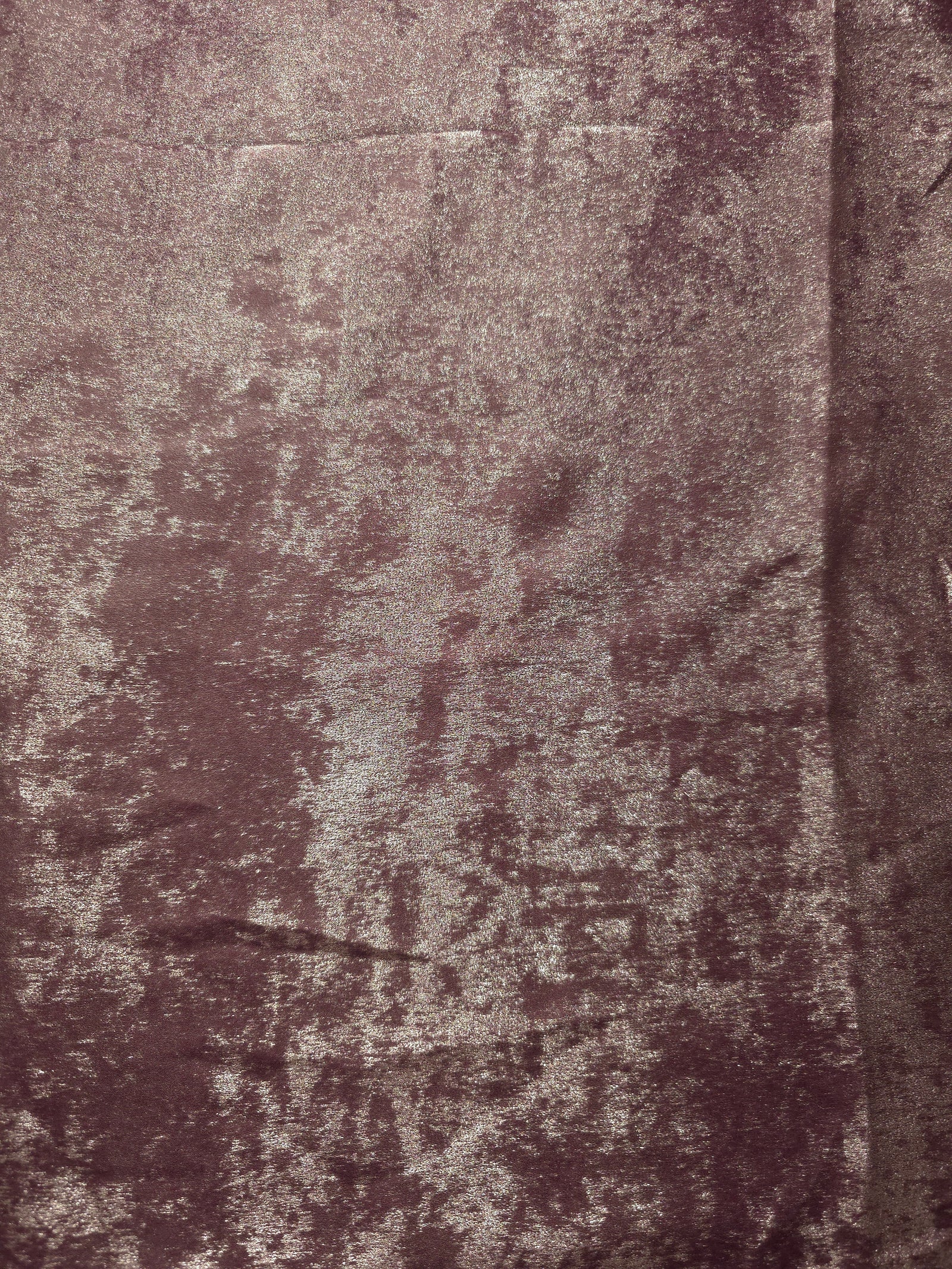 Flat view of Dusty Plum Lurex Italiano fabric showing its metallic foil surface for luxury apparel.