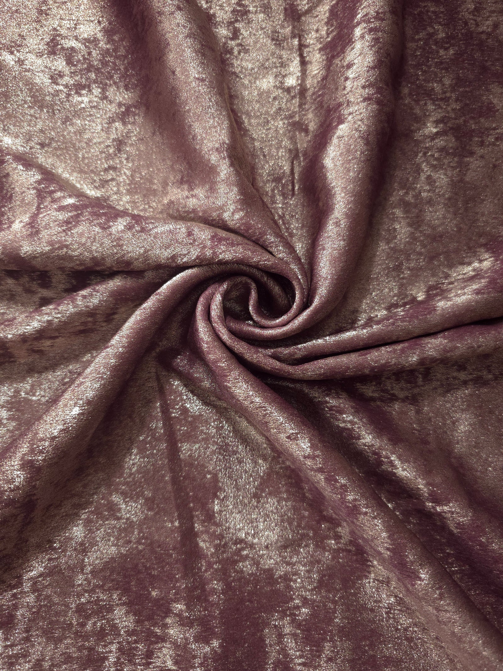 Rosette drape of Dusty Plum Lurex Italiano fabric emphasizing shimmer for kaftans and occasionwear.