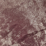 Macro close-up of Dusty Plum Lurex Italiano fabric revealing metallic texture for designer apparel.
