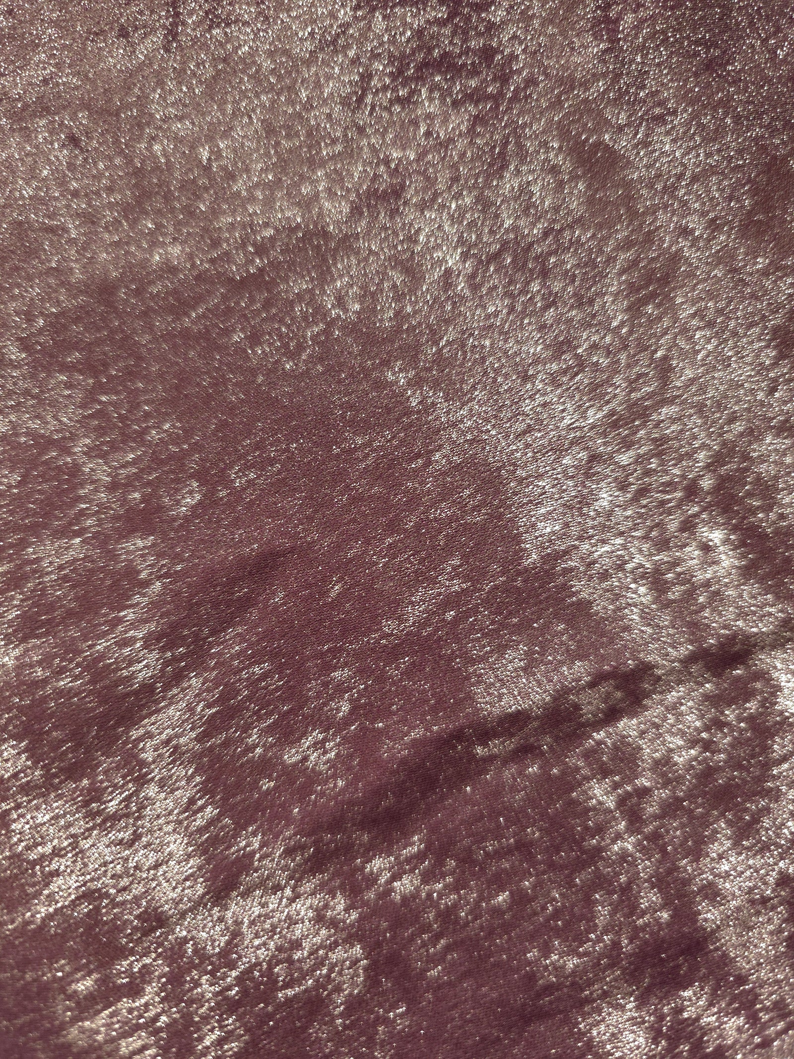 Macro close-up of Dusty Plum Lurex Italiano fabric revealing metallic texture for designer apparel.