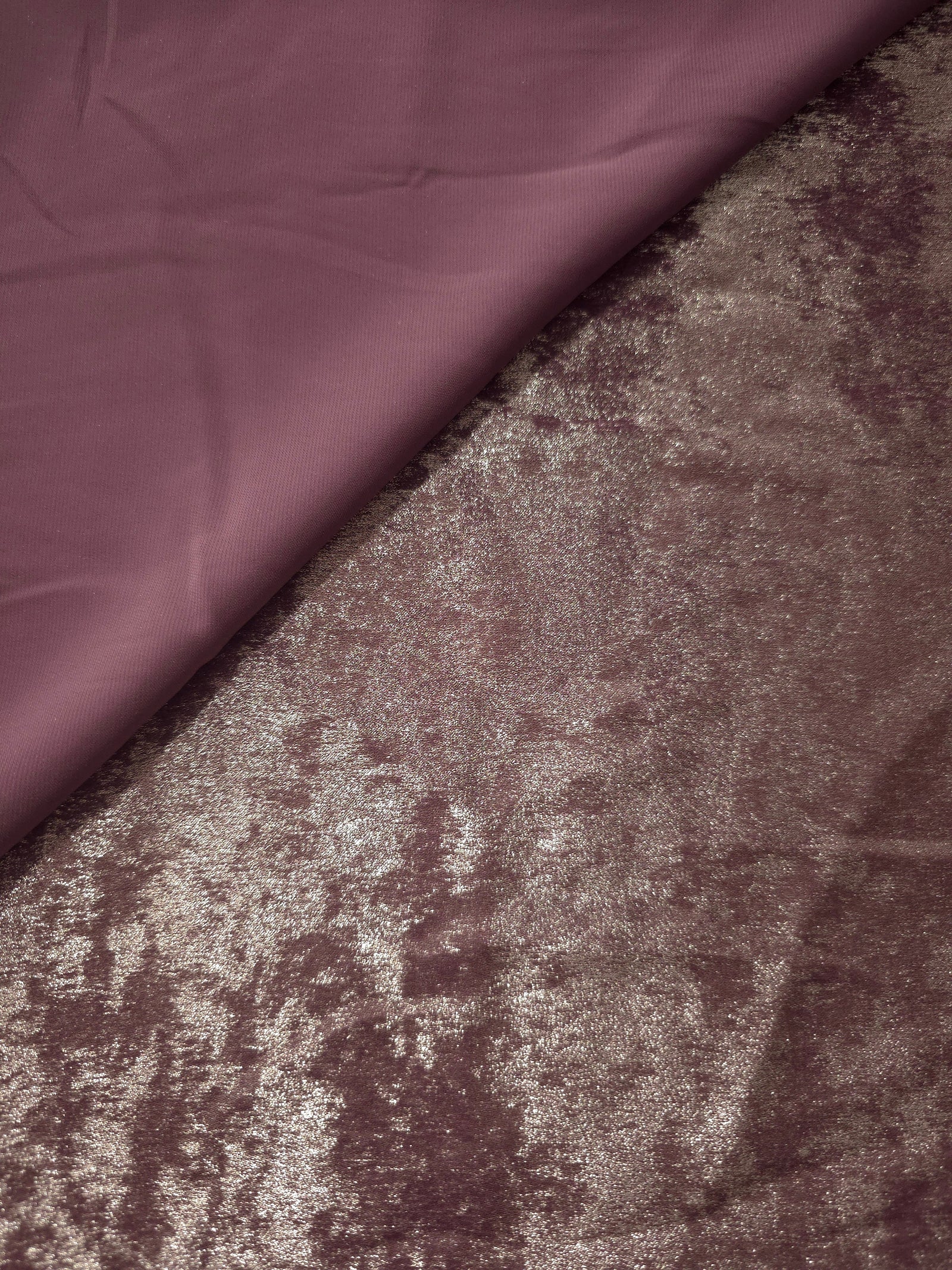 Reverse side of Dusty Plum Lurex Italiano fabric showing the backing and metallic finish for garment production.