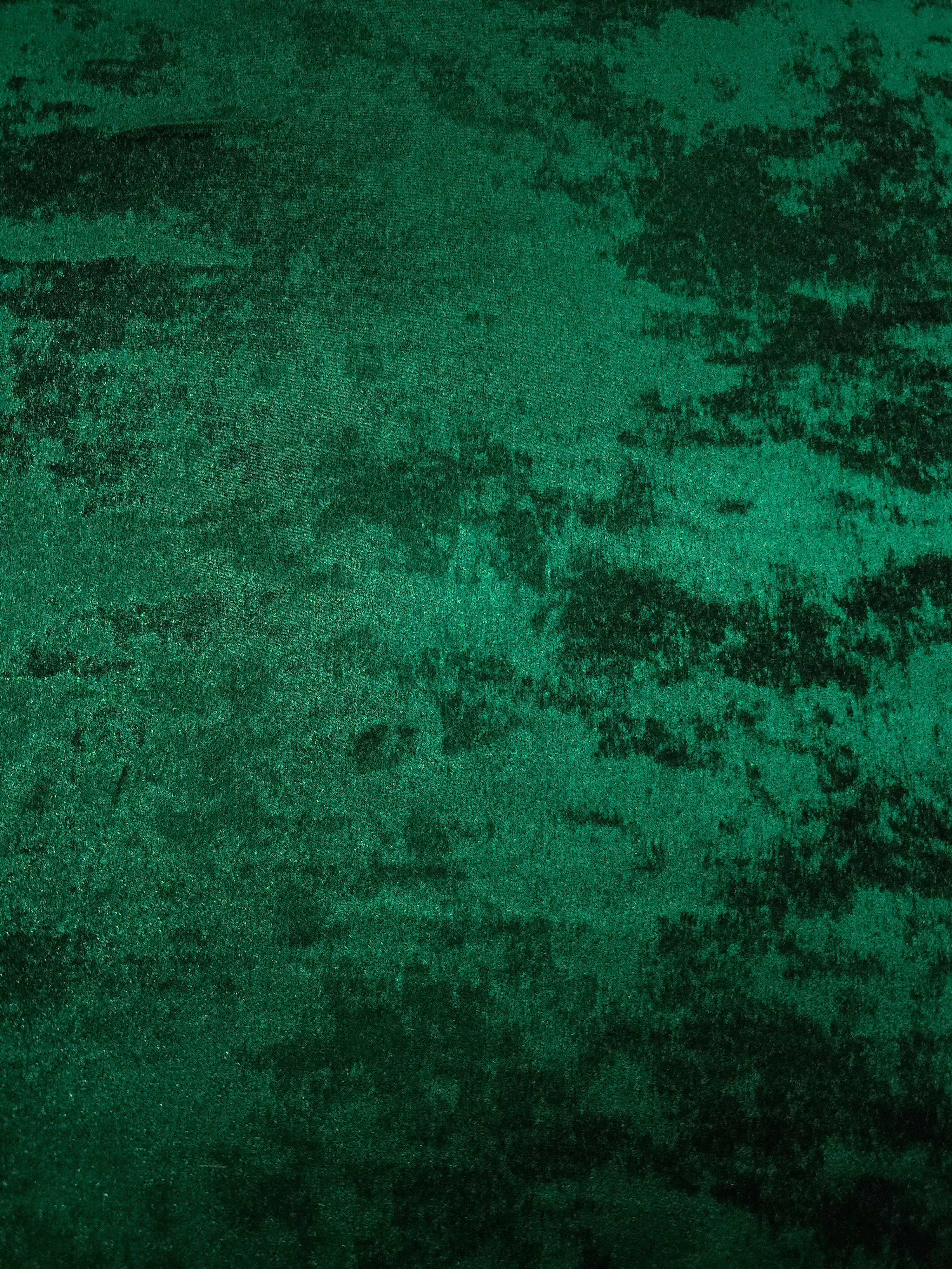 Flat view of Emerald Green Lurex Italiano fabric showing its metallic foil surface for luxury apparel.