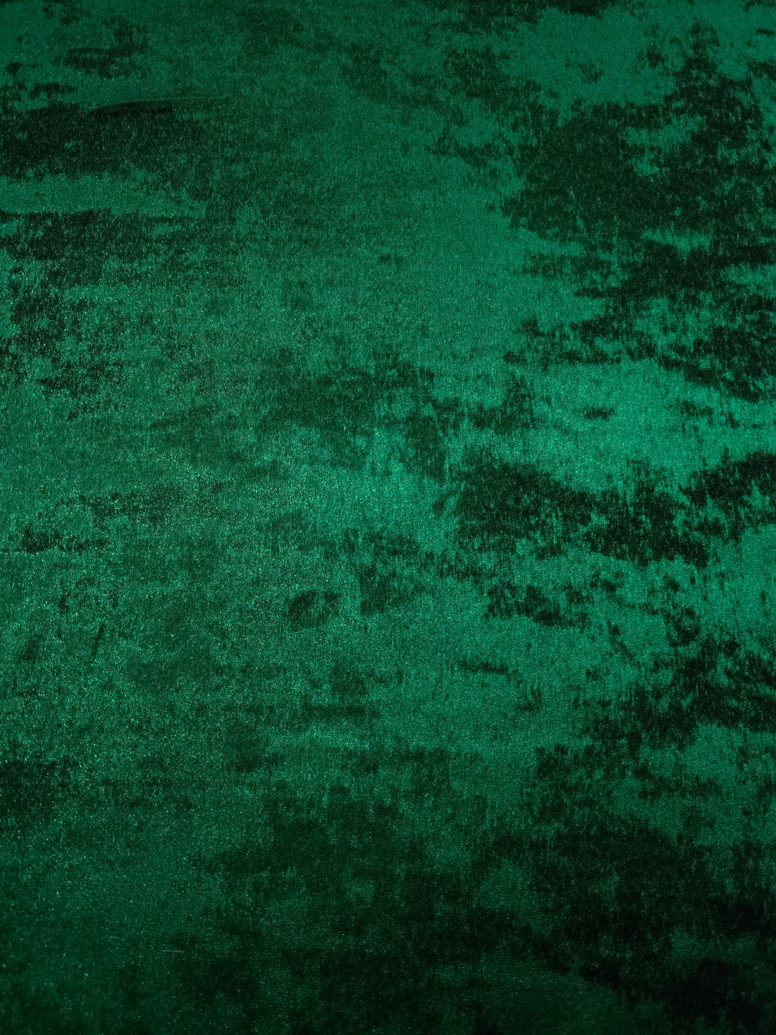 Flat view of Emerald Green Lurex Italiano fabric showing its metallic foil surface for luxury apparel.