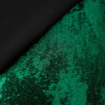 Reverse side of Emerald Green Lurex Italiano fabric showing the backing and metallic finish for garment production.