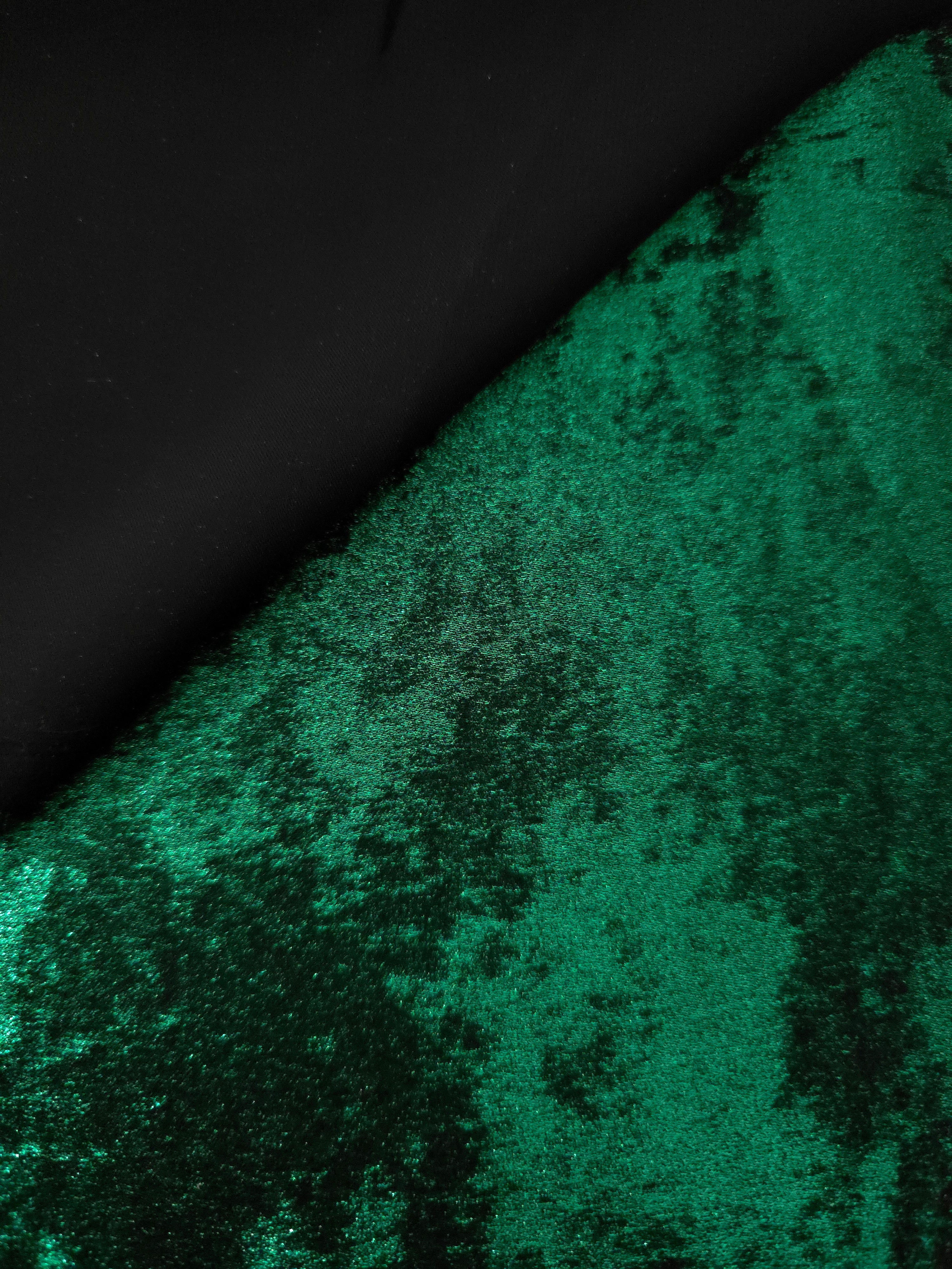 Reverse side of Emerald Green Lurex Italiano fabric showing the backing and metallic finish for garment production.