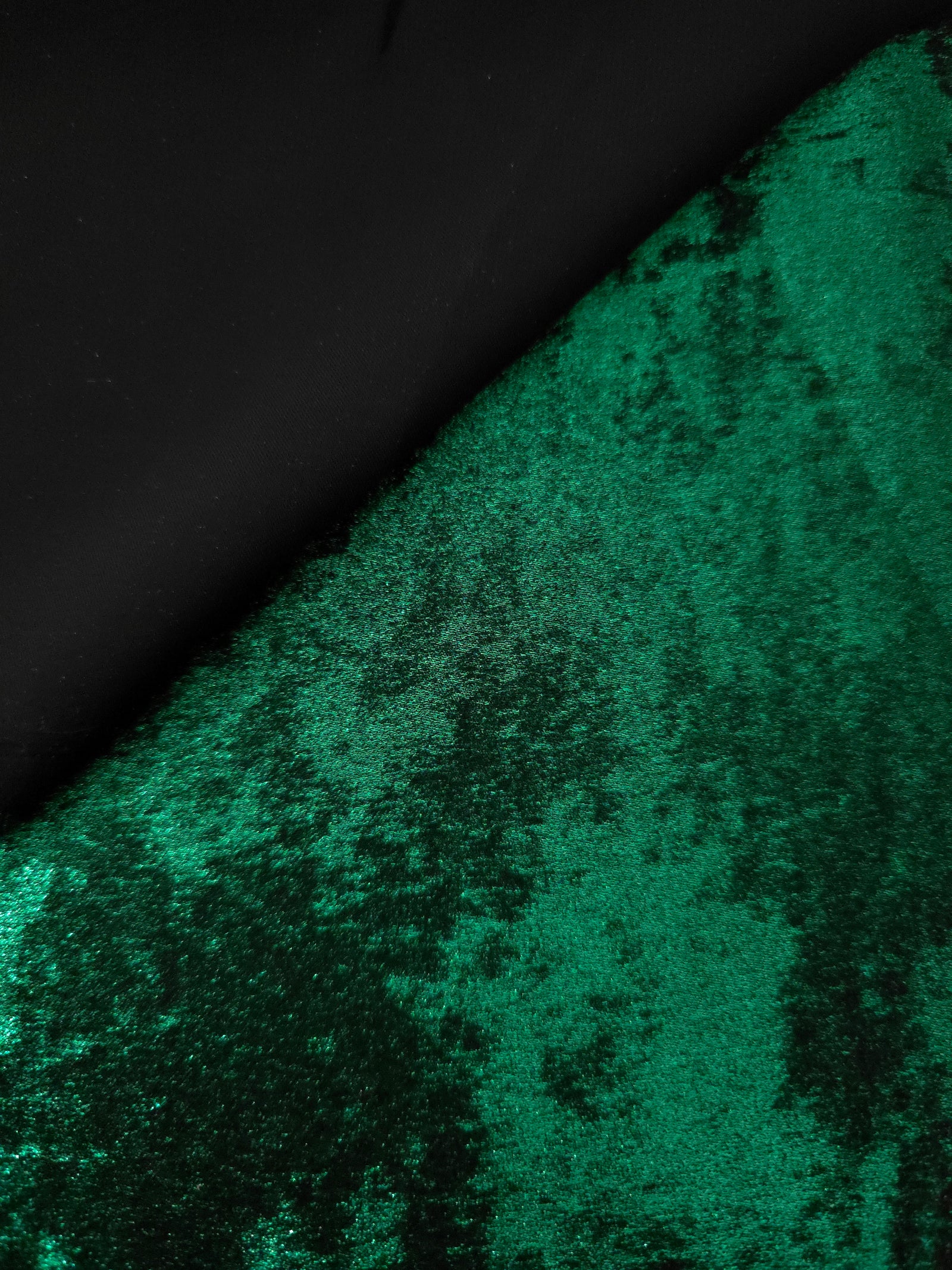 Reverse side of Emerald Green Lurex Italiano fabric showing the backing and metallic finish for garment production.