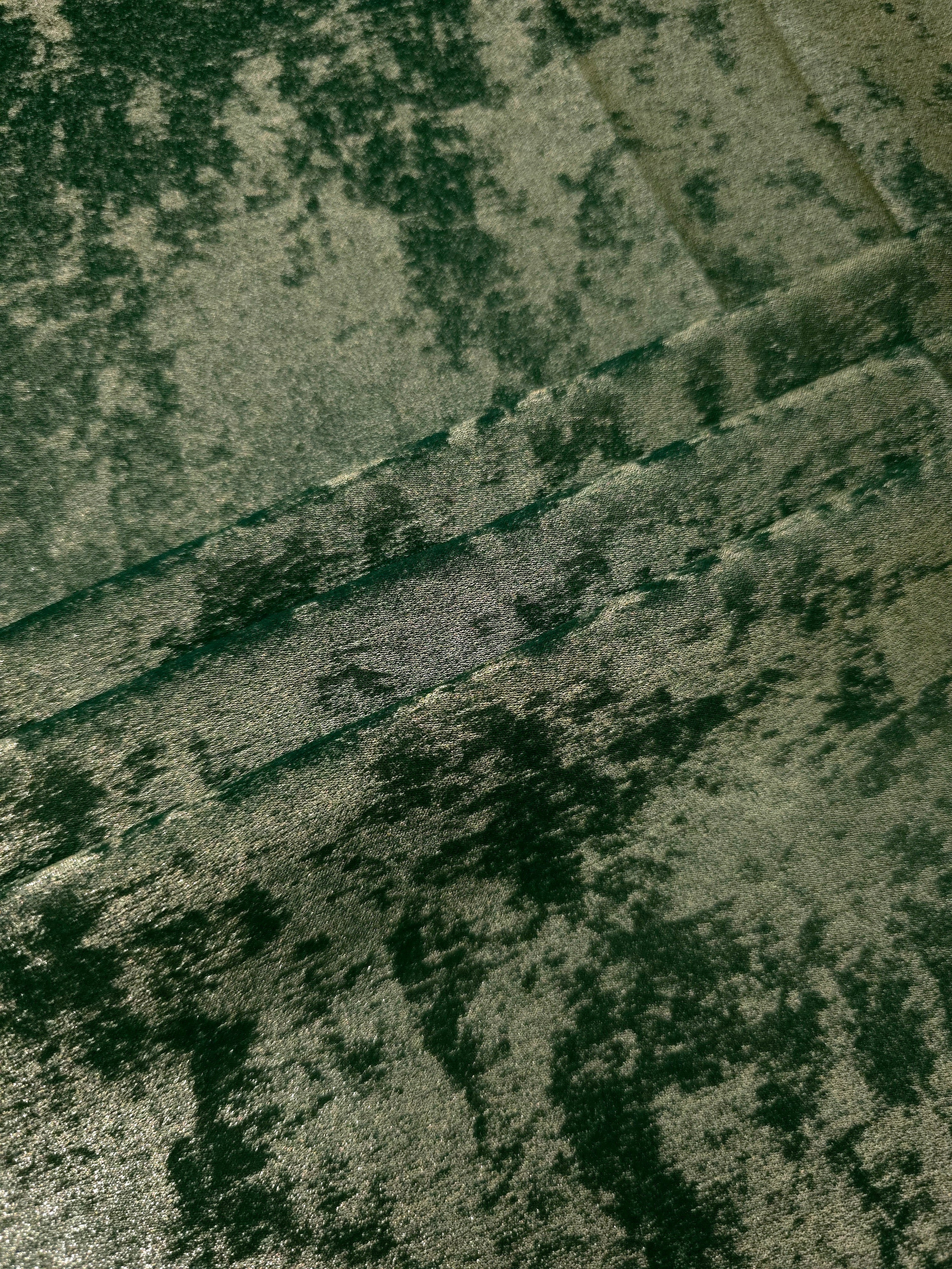 Forest Green Lurex Italiano metallic fabric arranged in diagonal eveningwear folds