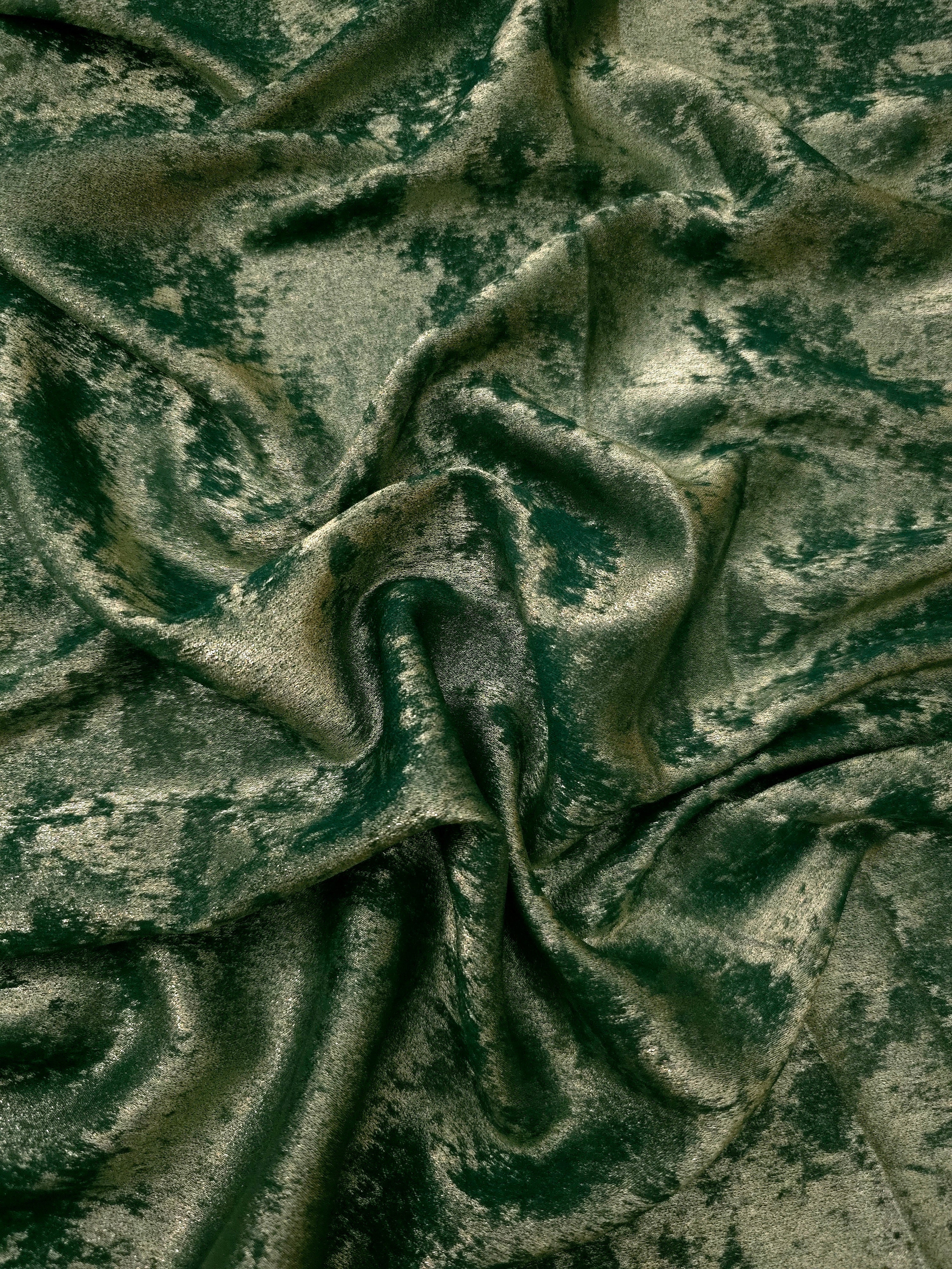 Fluid drape of Forest Green Lurex Italiano metallic fabric for abayas and gowns