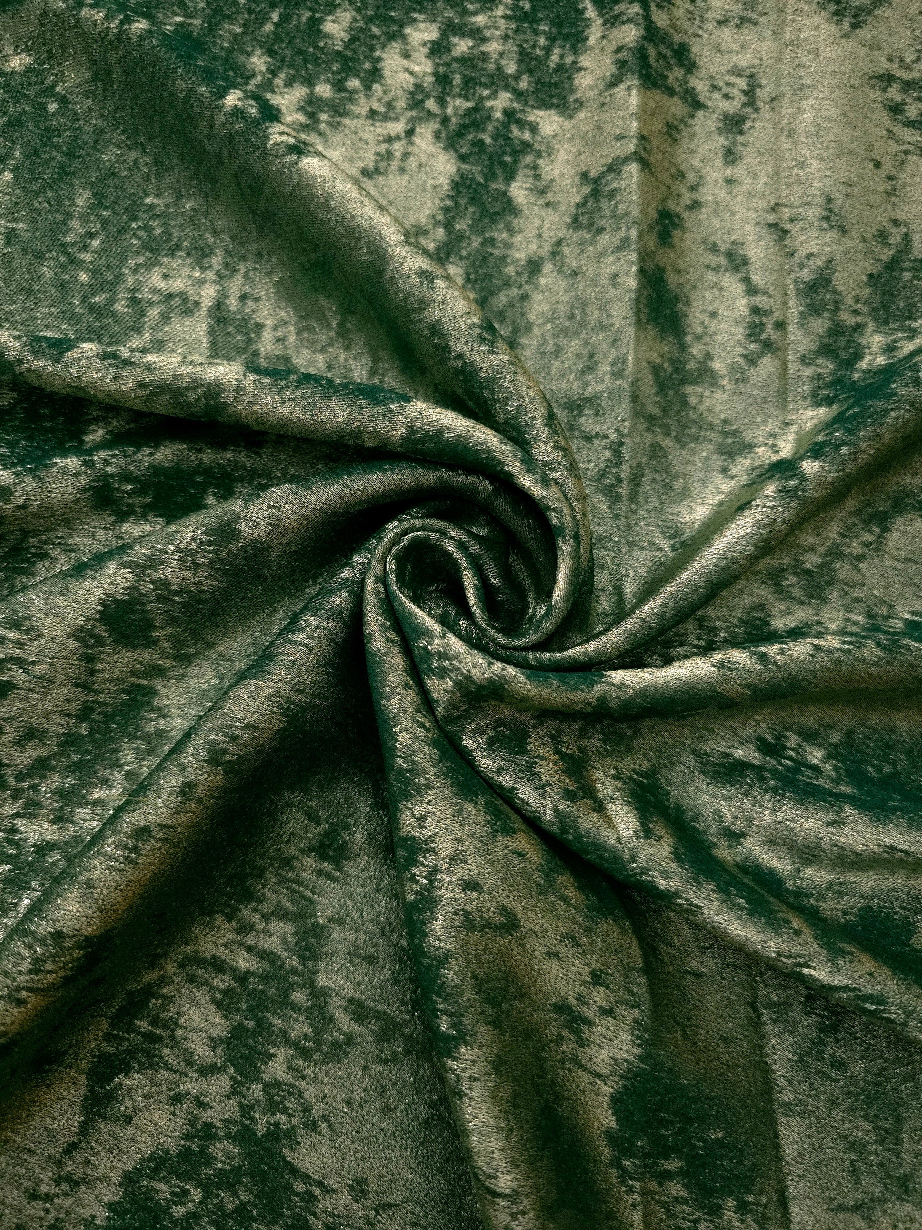 Forest Green Lurex Italiano metallic fabric in a rosette drape with rich shimmer