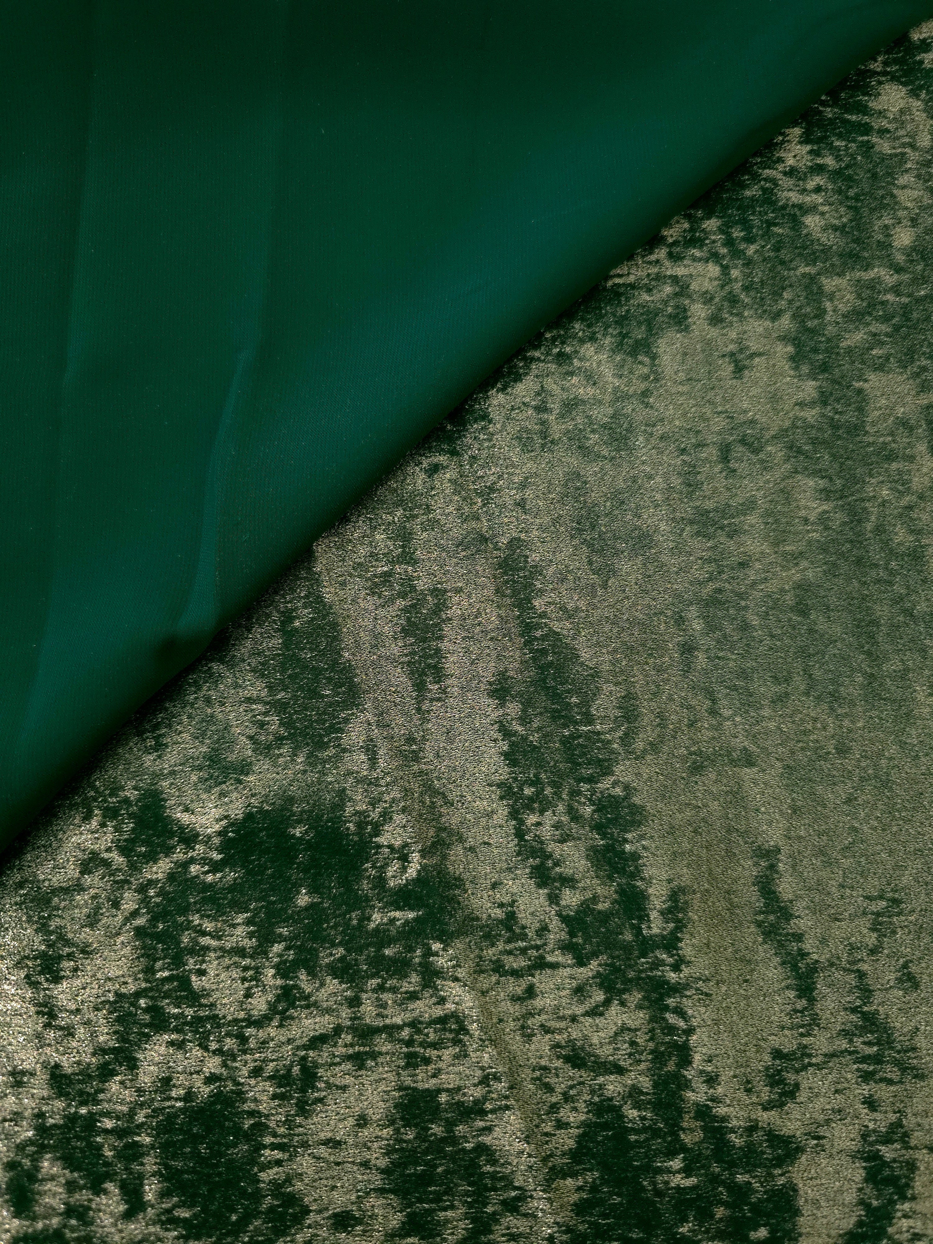 Reverse side of Forest Green Lurex Italiano metallic fabric for apparel construction