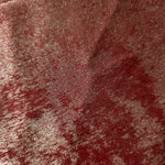 Macro close-up of Garnet Rose Lurex Italiano fabric revealing metallic texture for designer apparel.