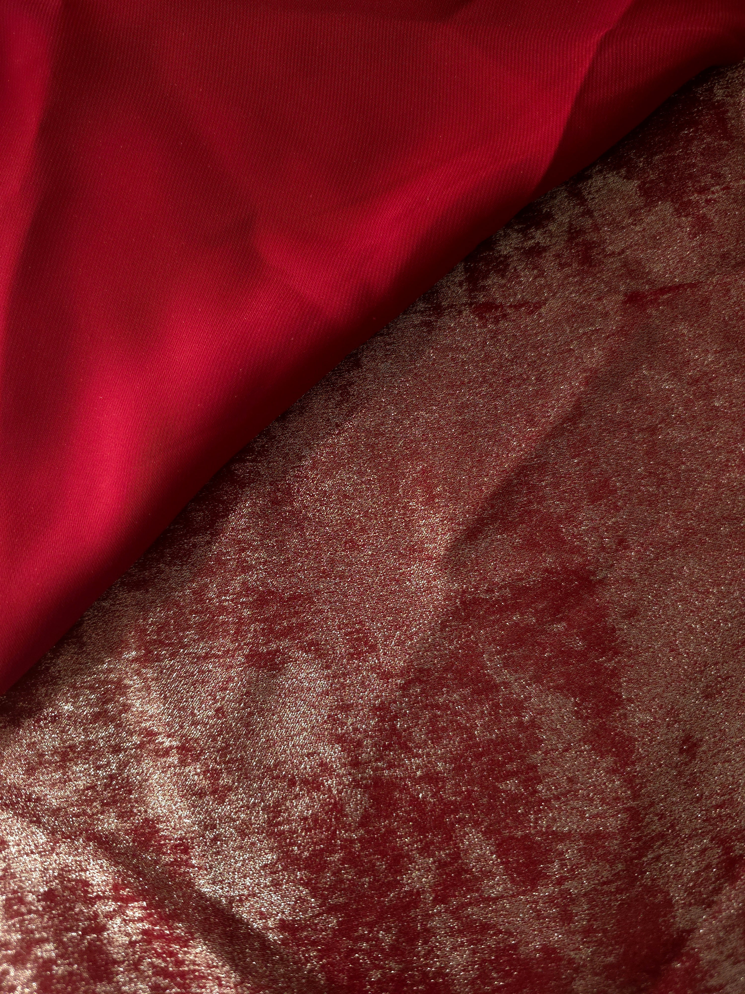 Reverse side of Garnet Rose Lurex Italiano fabric showing the backing and metallic finish for garment production.