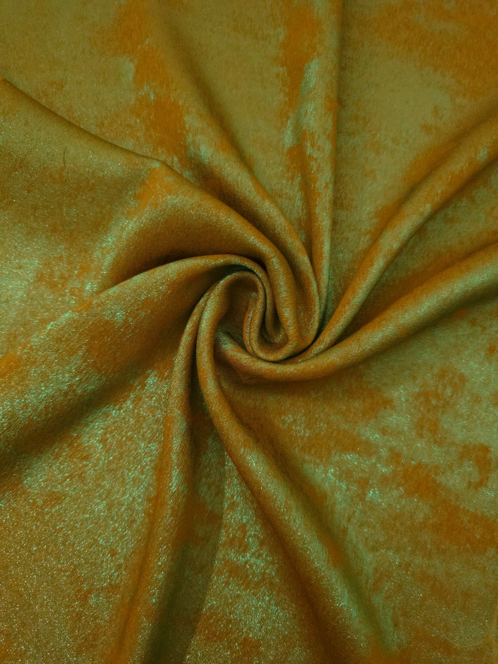Rosette drape of Golden Olive Lurex Italiano fabric emphasizing shimmer for kaftans and occasionwear.