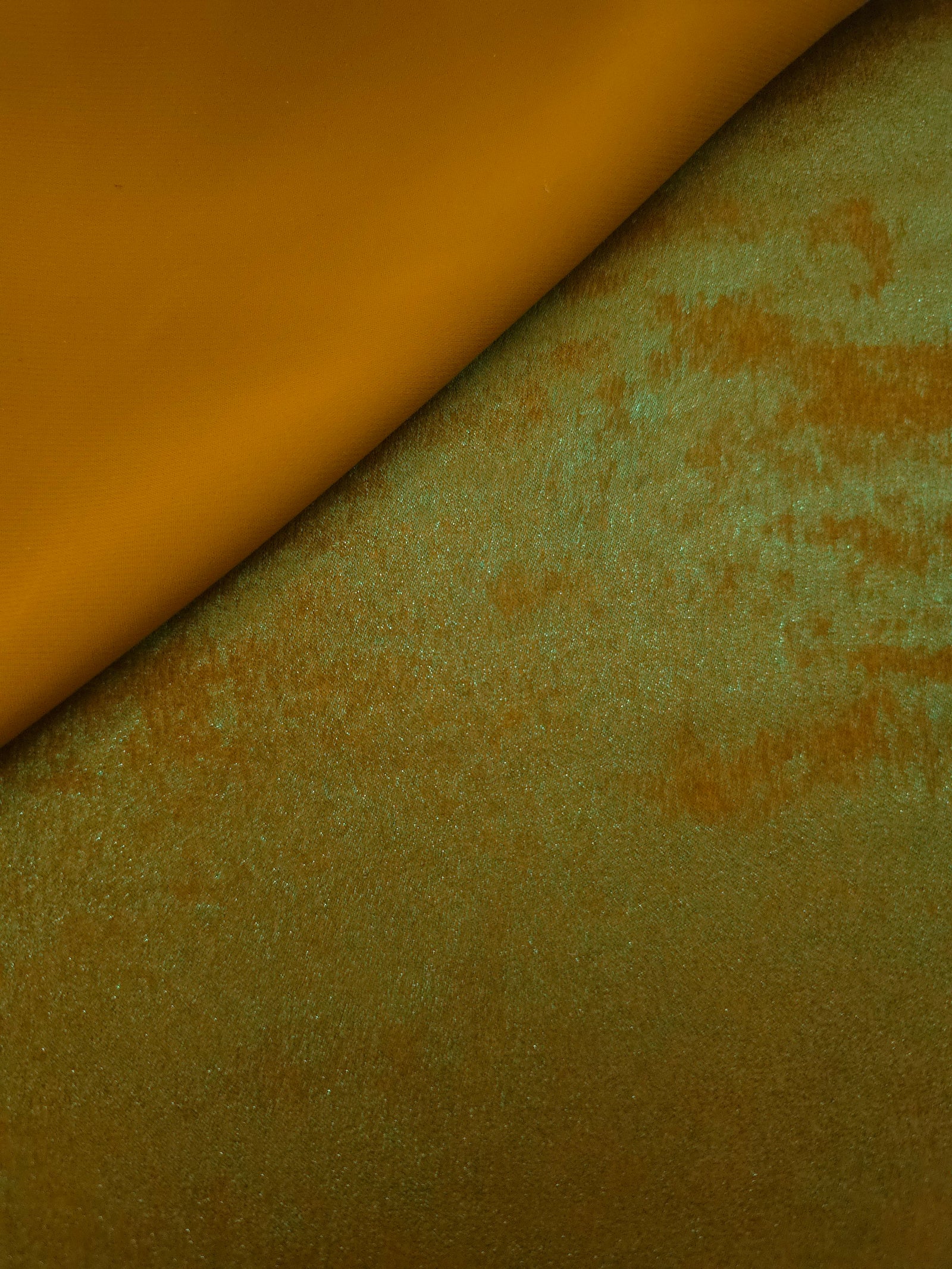 Reverse side of Golden Olive Lurex Italiano fabric showing the backing and metallic finish for garment production.