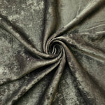 Flowing folds of Graphite Silver Lurex Italiano fabric highlighting drape for abayas, kaftans and dresses.