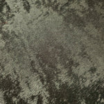 Macro close-up of Graphite Silver Lurex Italiano fabric revealing metallic texture for designer apparel.