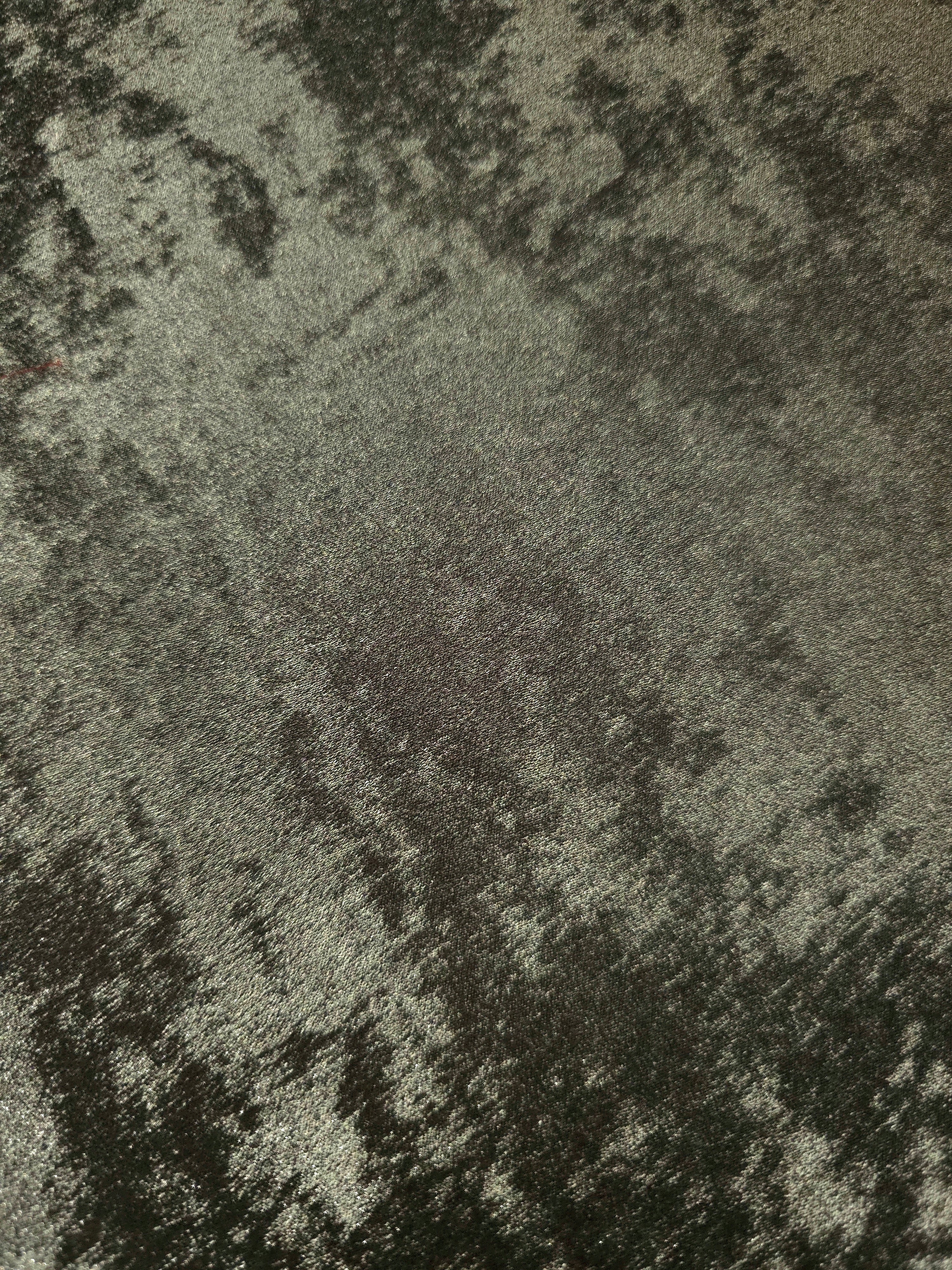 Macro close-up of Graphite Silver Lurex Italiano fabric revealing metallic texture for designer apparel.
