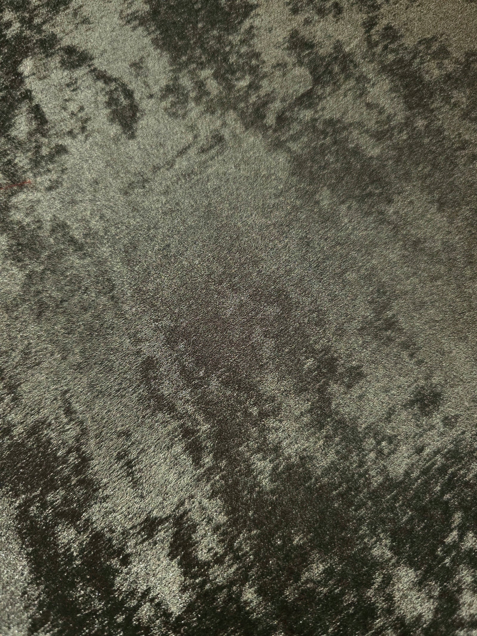 Macro close-up of Graphite Silver Lurex Italiano fabric revealing metallic texture for designer apparel.