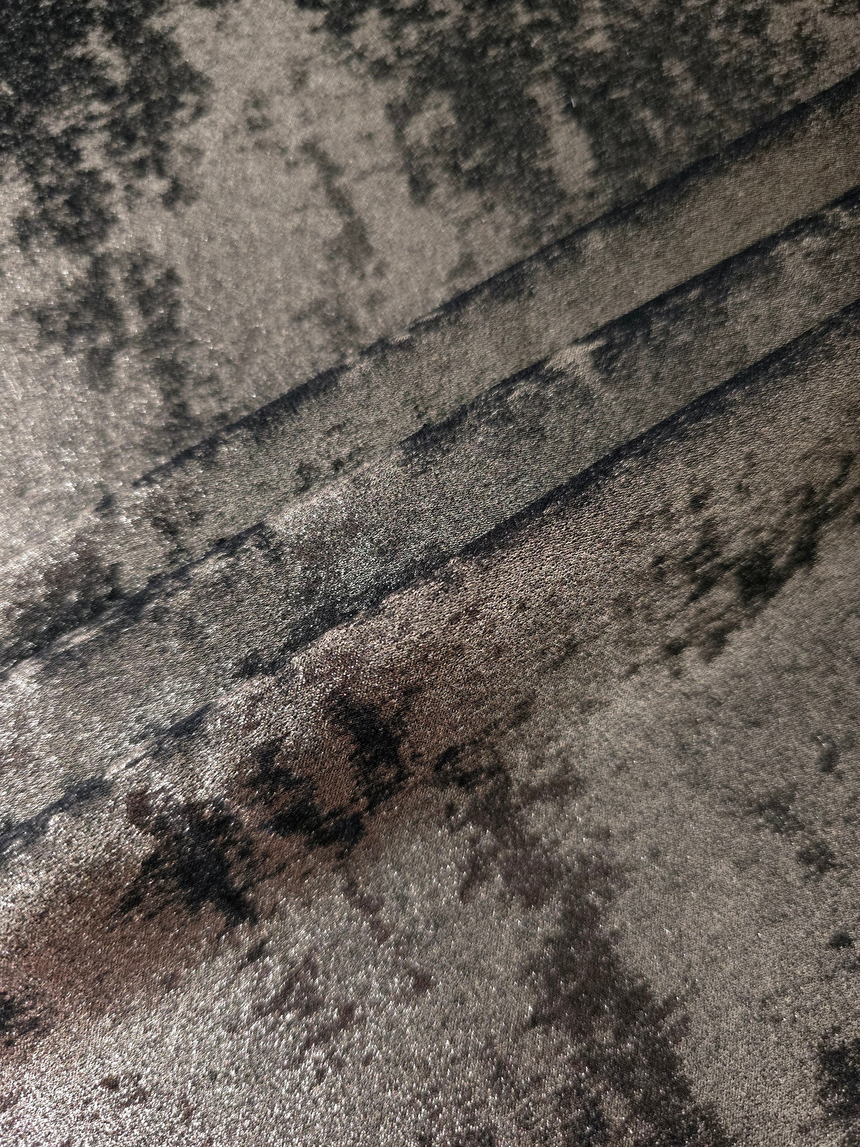 Gunmetal Navy Lurex Italiano metallic fabric in a rosette drape with cool shimmer
