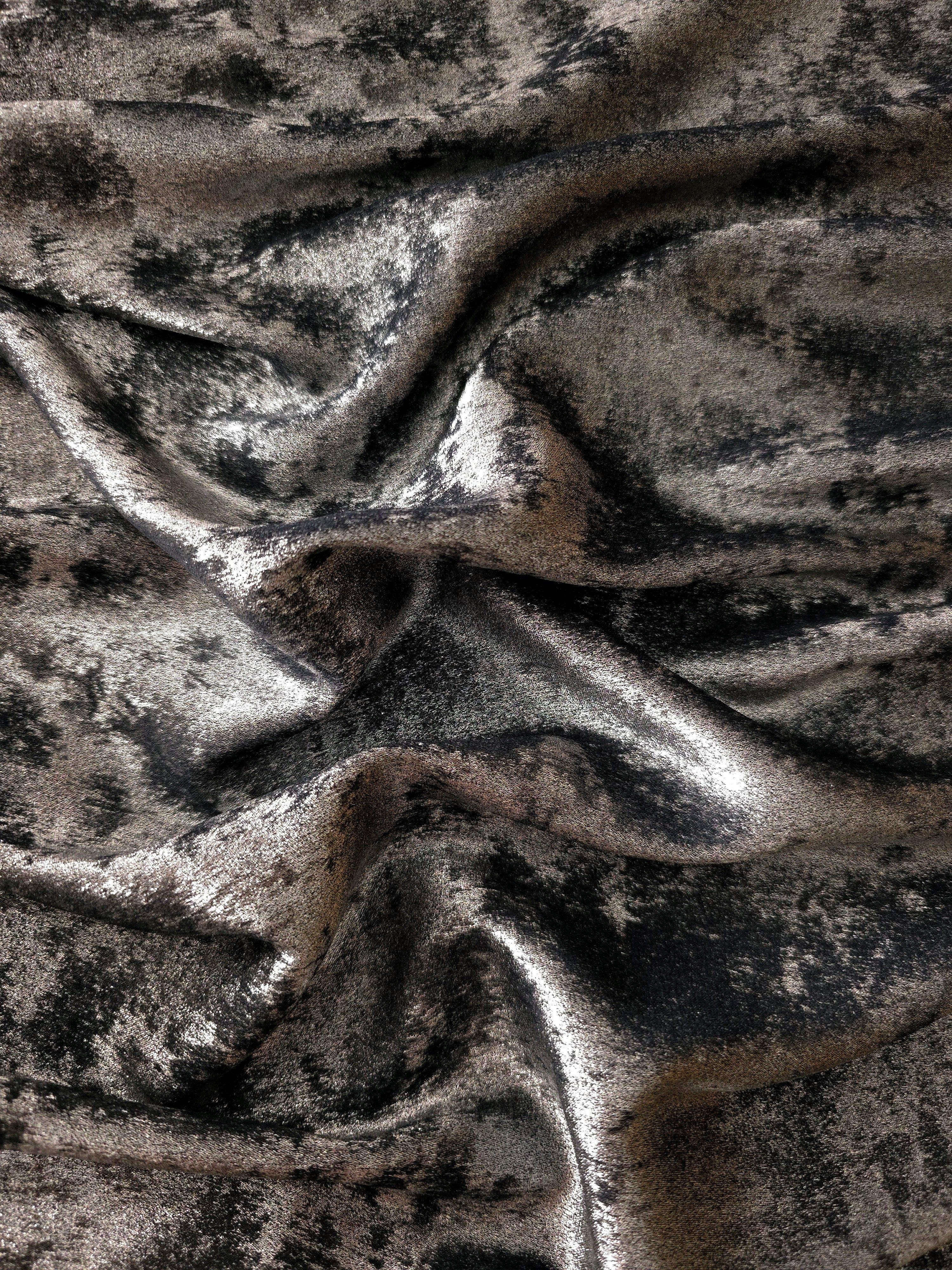 Reverse side of Gunmetal Navy Lurex Italiano metallic fabric for garment construction