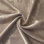 Flowing folds of Ivory Pearl Lurex Italiano fabric highlighting drape for abayas, kaftans and dresses.