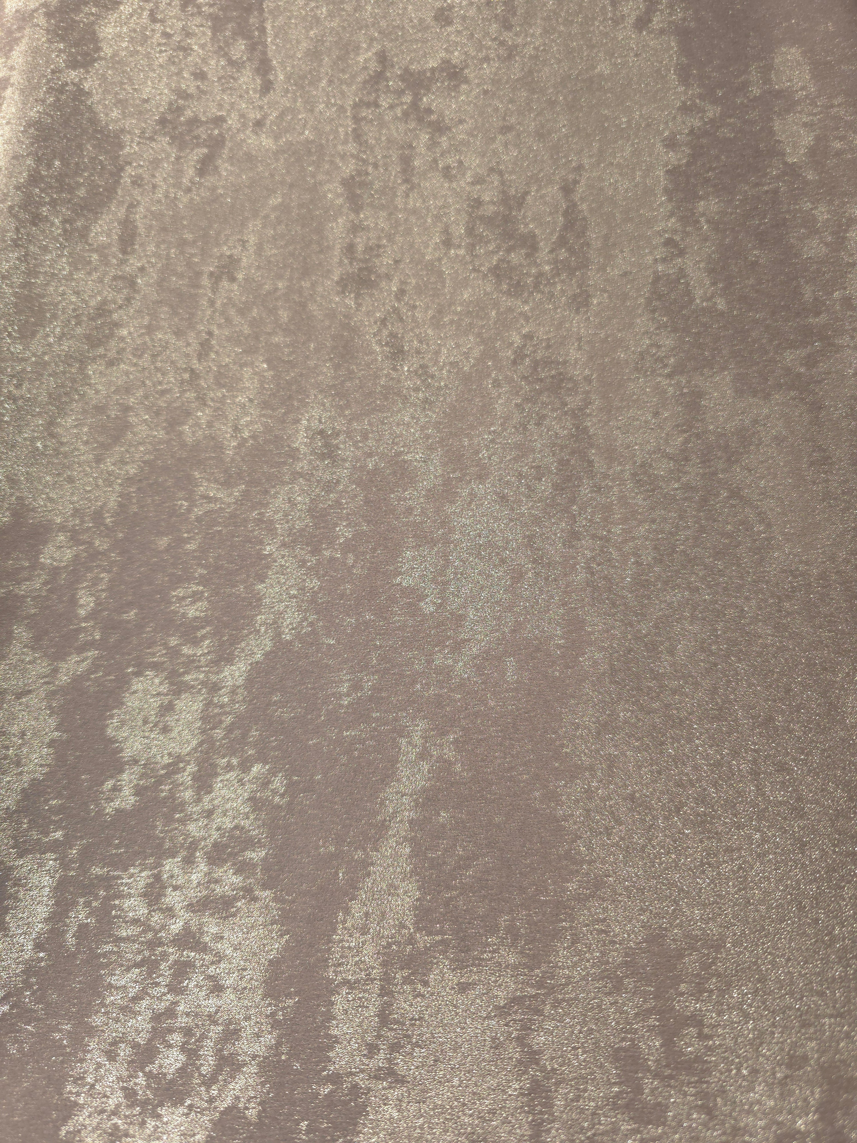Flat view of Ivory Pearl Lurex Italiano fabric showing its metallic foil surface for luxury apparel.