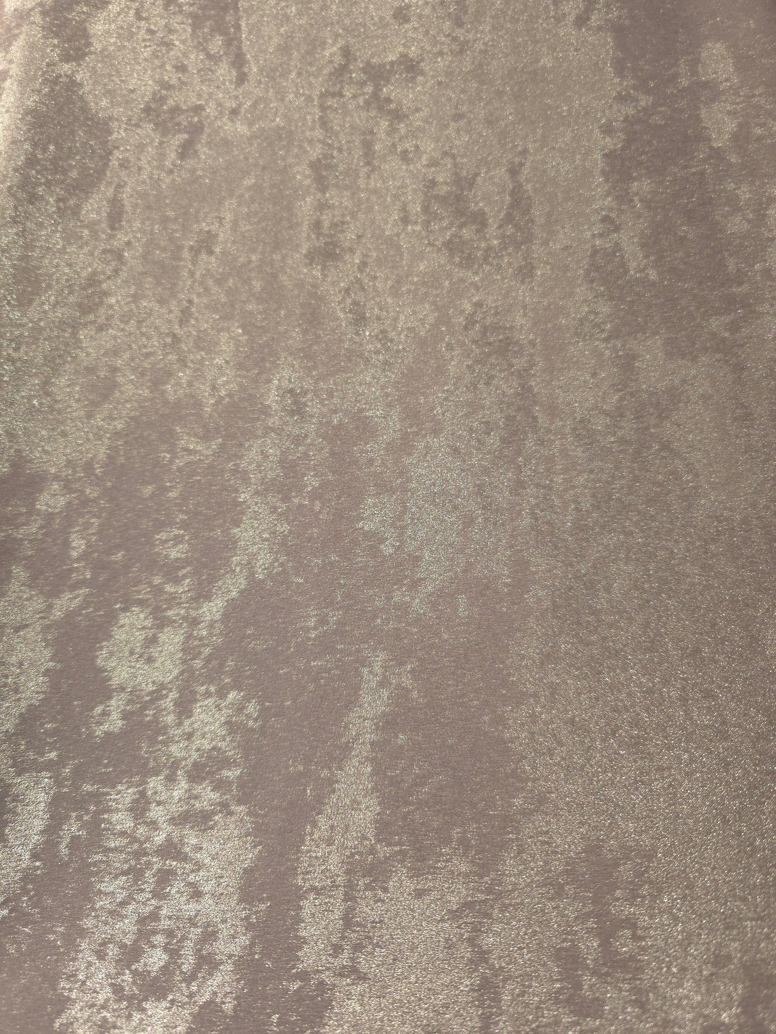 Flat view of Ivory Pearl Lurex Italiano fabric showing its metallic foil surface for luxury apparel.