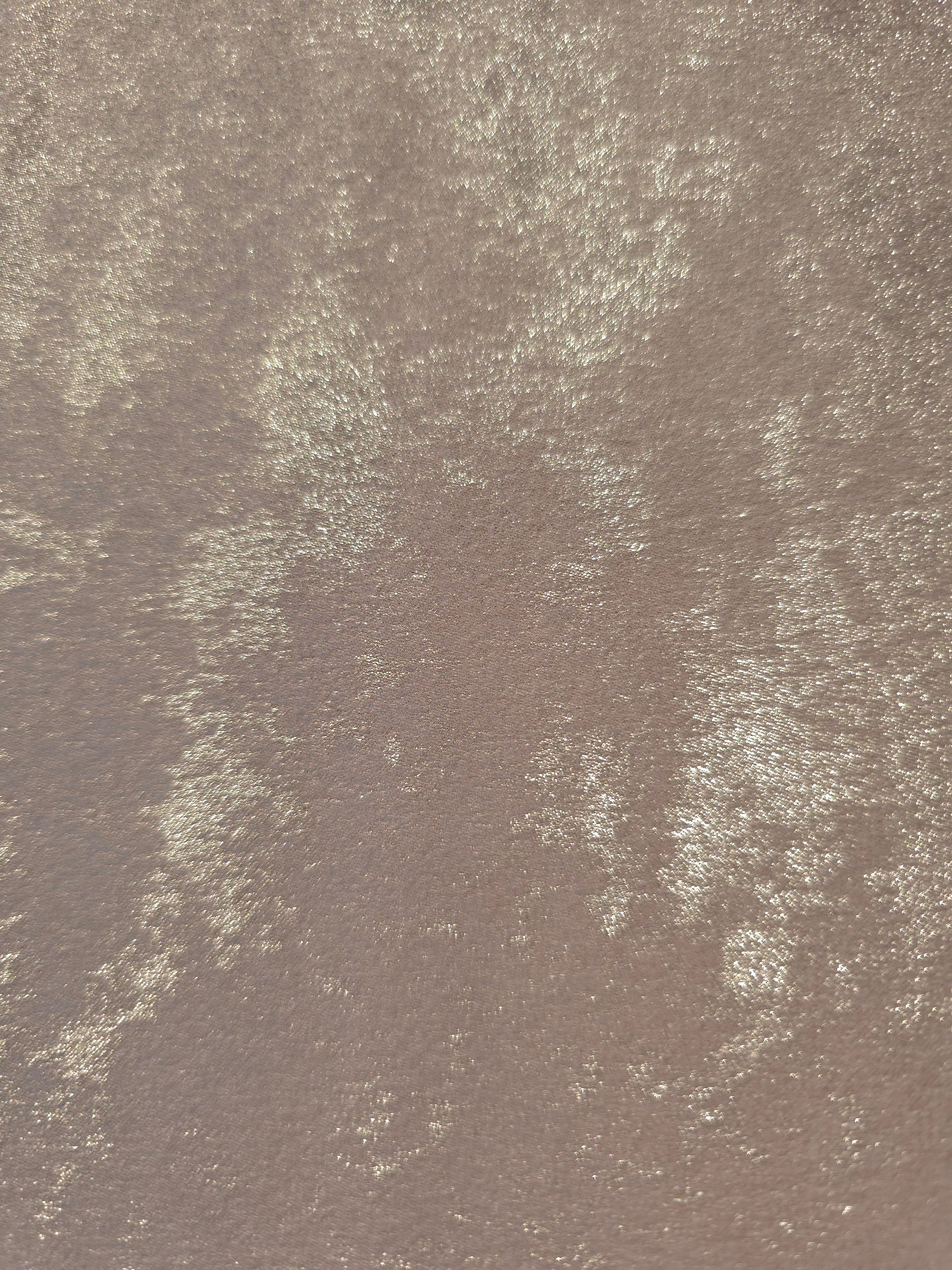 Macro close-up of Ivory Pearl Lurex Italiano fabric revealing metallic texture for designer apparel.