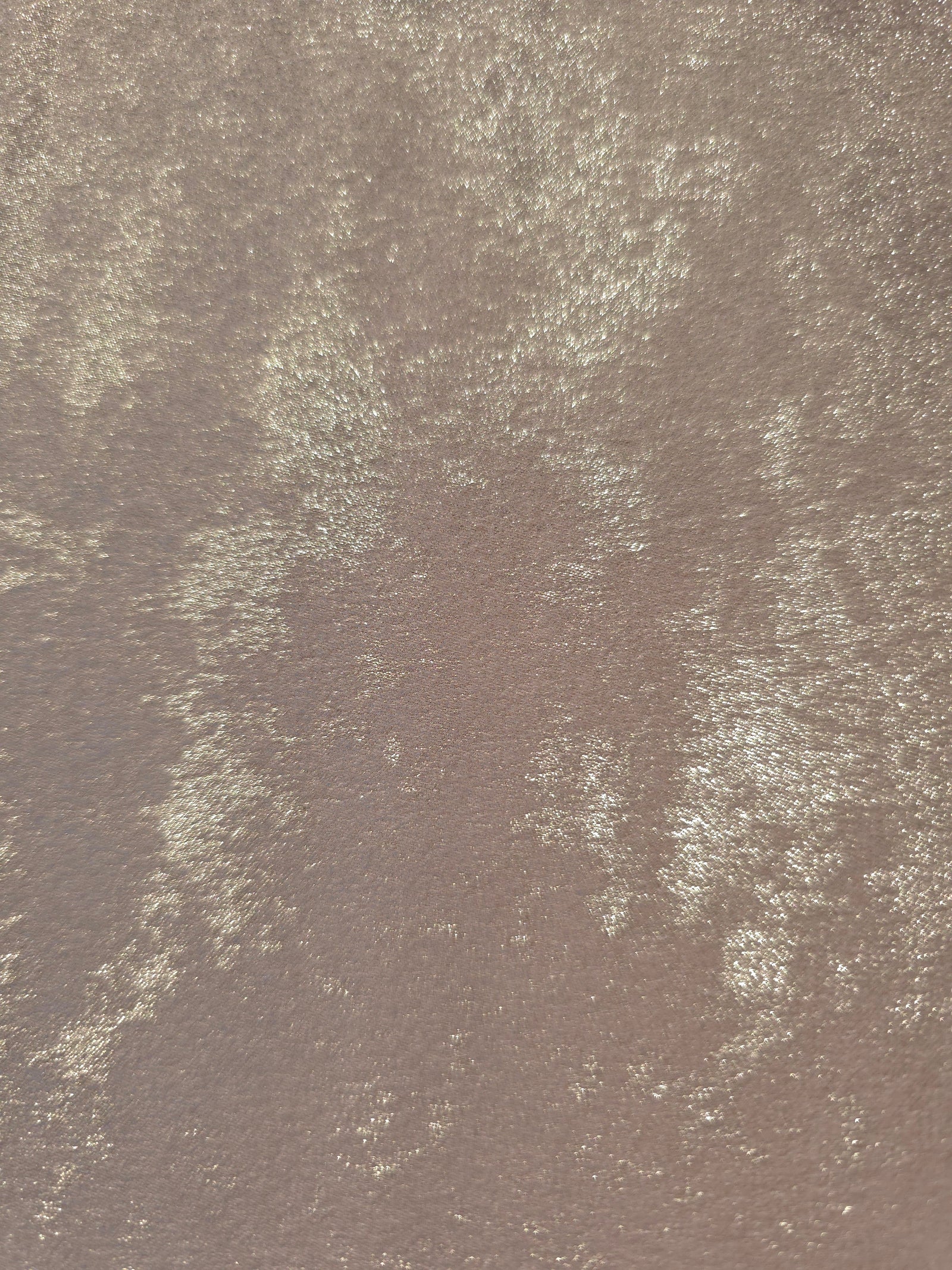 Macro close-up of Ivory Pearl Lurex Italiano fabric revealing metallic texture for designer apparel.
