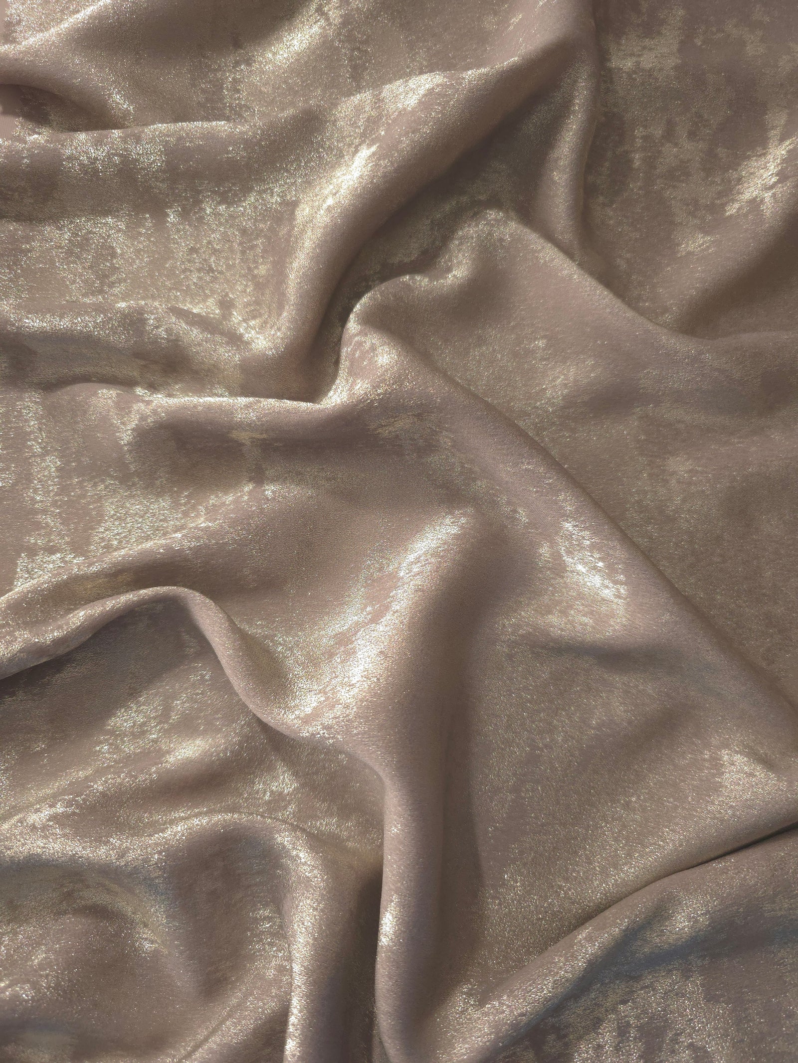 Reverse side of Ivory Pearl Lurex Italiano fabric showing the backing and metallic finish for garment production.