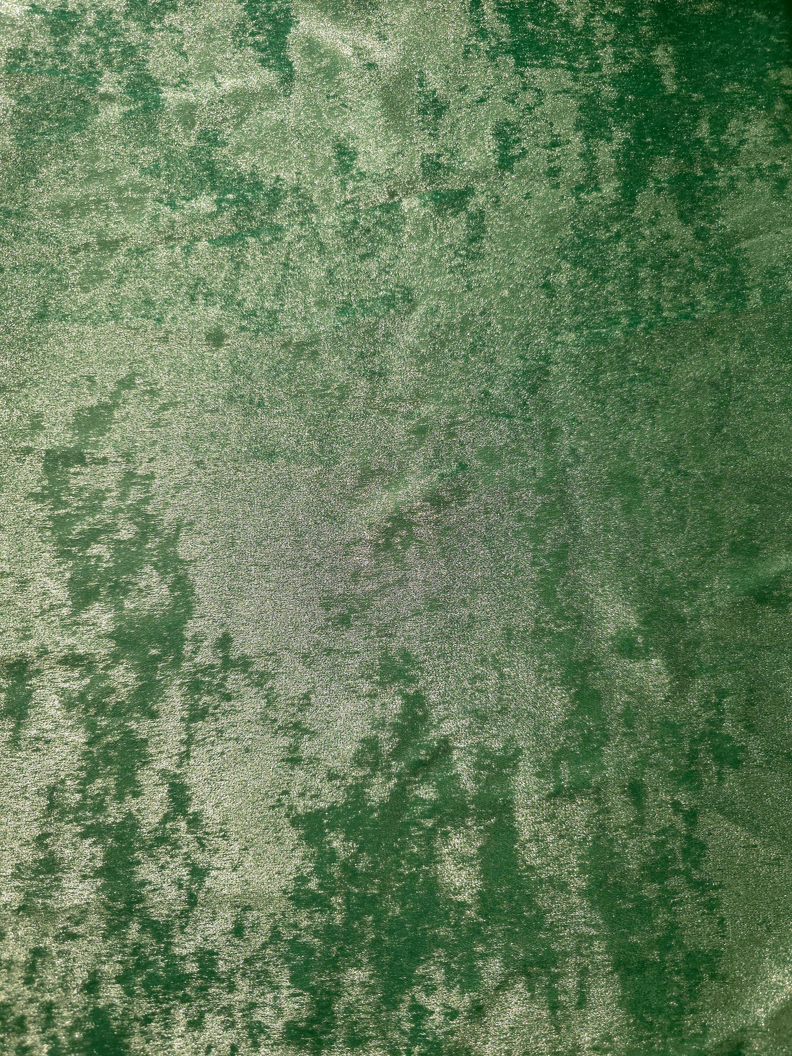 Flat texture view of Jade Green Lurex Italiano metallic fabric for luxury fashion