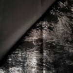 Flowing folds of Jet Black Lurex Italiano fabric highlighting drape for abayas, kaftans and dresses.