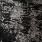 Flat view of Jet Black Lurex Italiano fabric showing its metallic foil surface for luxury apparel.