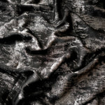 Reverse side of Jet Black Lurex Italiano fabric showing the backing and metallic finish for garment production.