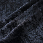 Midnight Navy Lurex Italiano fabric in diagonal folds showing metallic sheen and drape for eveningwear.