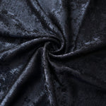 Rosette drape of Midnight Navy Lurex Italiano fabric emphasizing shimmer for kaftans and occasionwear.