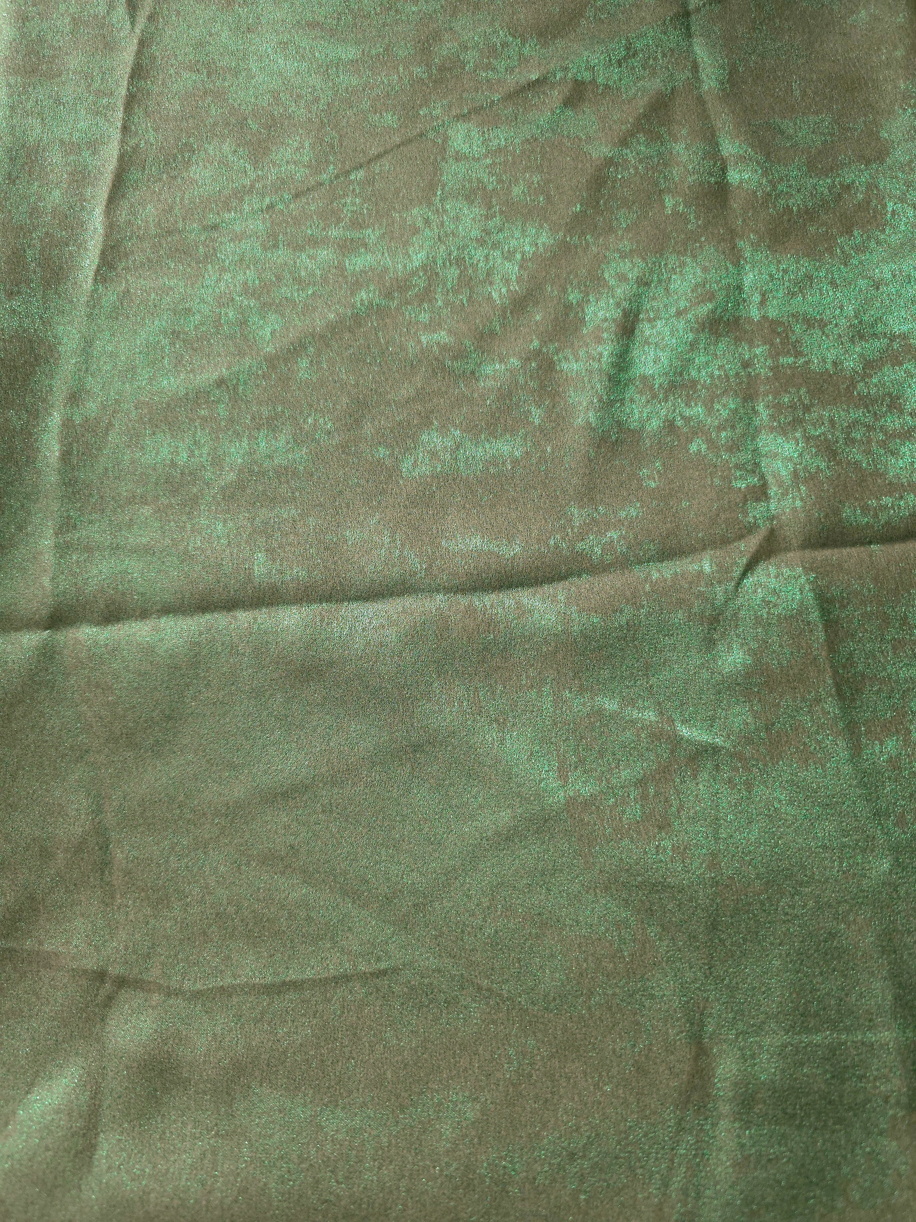 Flat view of Mint Sage Lurex Italiano fabric showing its metallic foil surface for luxury apparel.