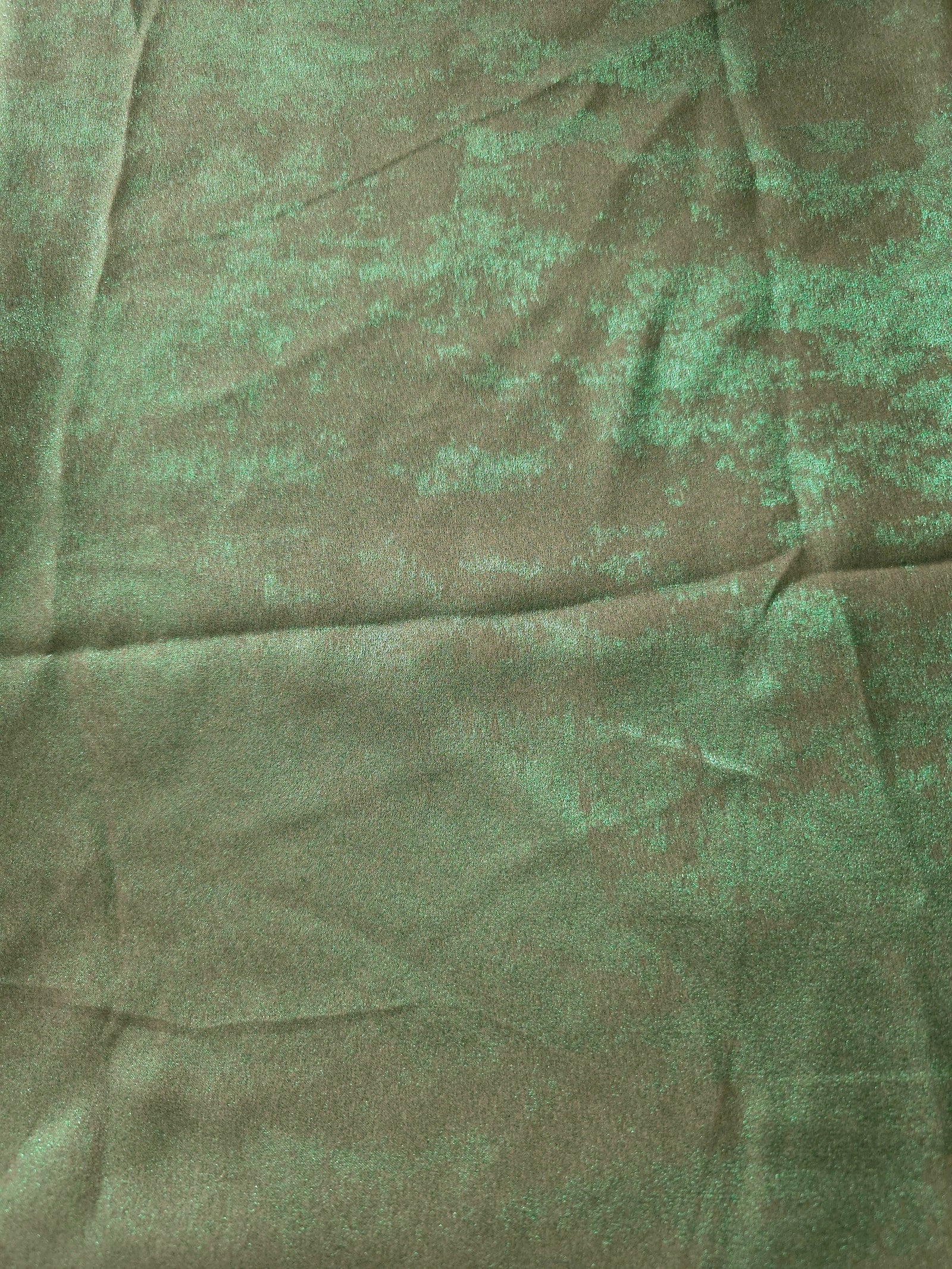 Flat view of Mint Sage Lurex Italiano fabric showing its metallic foil surface for luxury apparel.