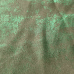 Macro close-up of Mint Sage Lurex Italiano fabric revealing metallic texture for designer apparel.