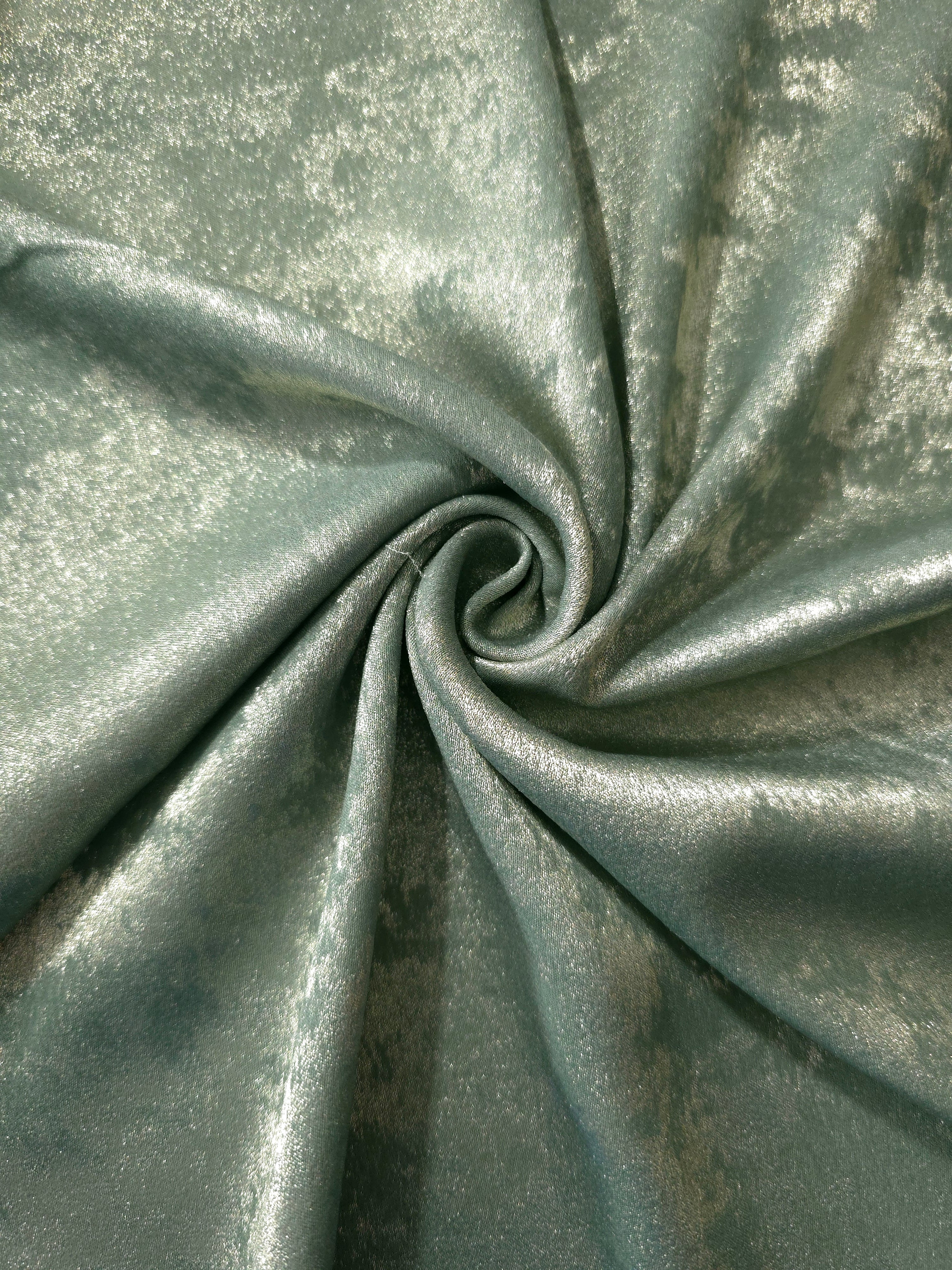 Fluid drape of Misty Sage Lurex Italiano metallic fabric for abayas and dresses